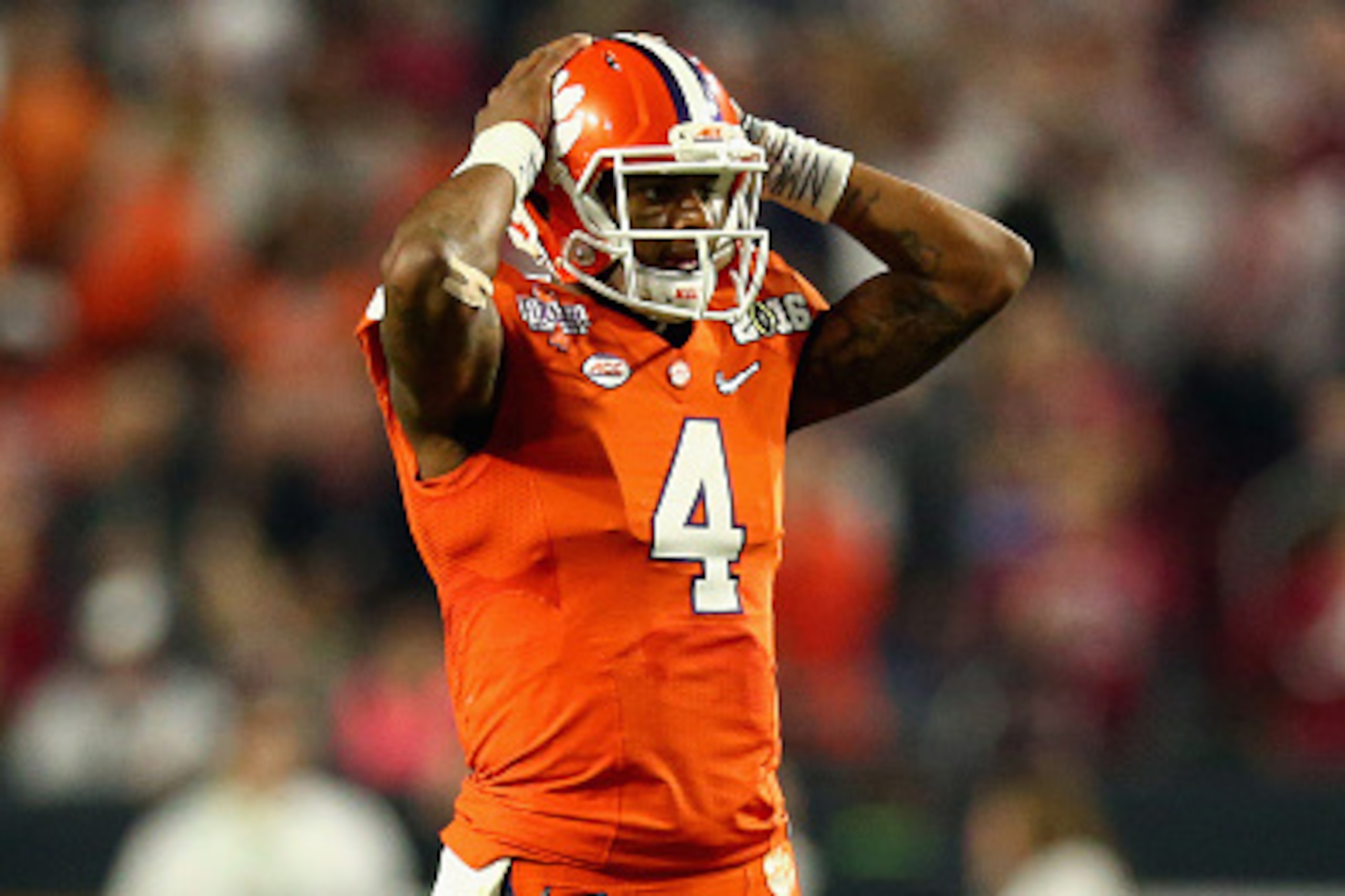 GLENDALE, AZ - JANUARY 11:  Deshaun Watson #4 of the Clemson Tigers reacts after Artavis Scott #3 missed an end zone pass broken up by Ronnie Harrison #15 of the Alabama Crimson Tide in the third quarter during the 2016 College Football Playoff National C