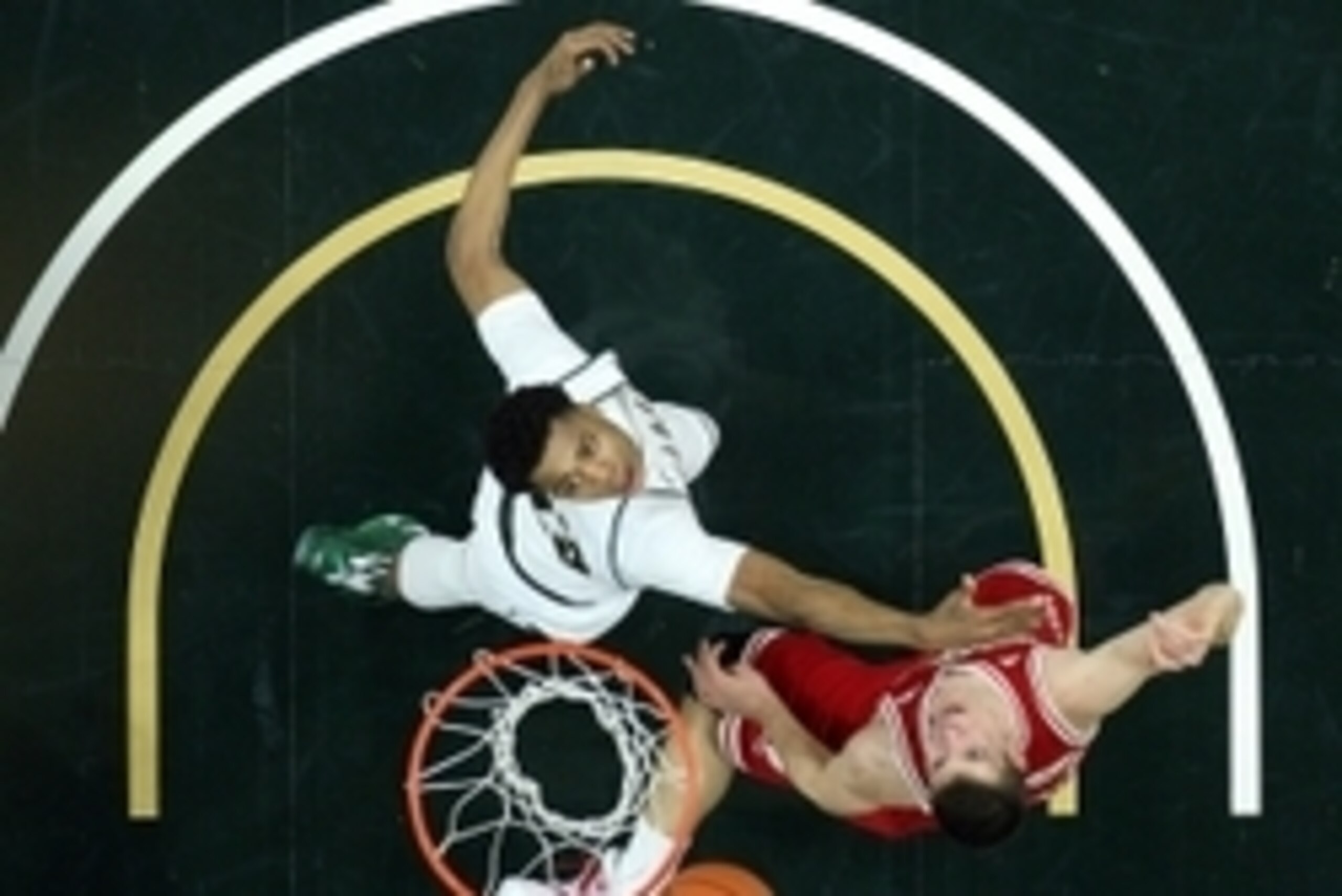 Feb 18, 2016; East Lansing, MI, USA; Michigan State Spartans forward Deyonta Davis (23) and Wisconsin Badgers forward Ethan Happ (22) fight for a rebound during the second half of a game at Jack Breslin Student Events Center. Mandatory Credit: Mike Carter