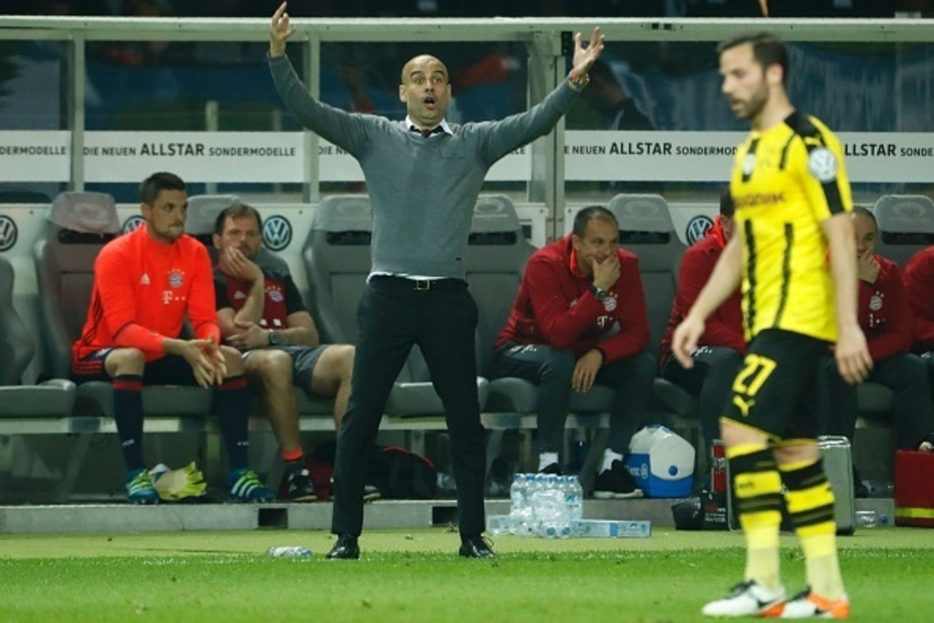 Bayern Munich's Spanish head coach Pep Guardiola reacts during the German Cup (DFB Pokal) final football match Bayern Munich vs Borussia Dortmund at the Olympic stadium in Berlin on May 21, 2016. / AFP / ODD ANDERSEN / RESTRICTIONS: ACCORDING TO DFB RULES