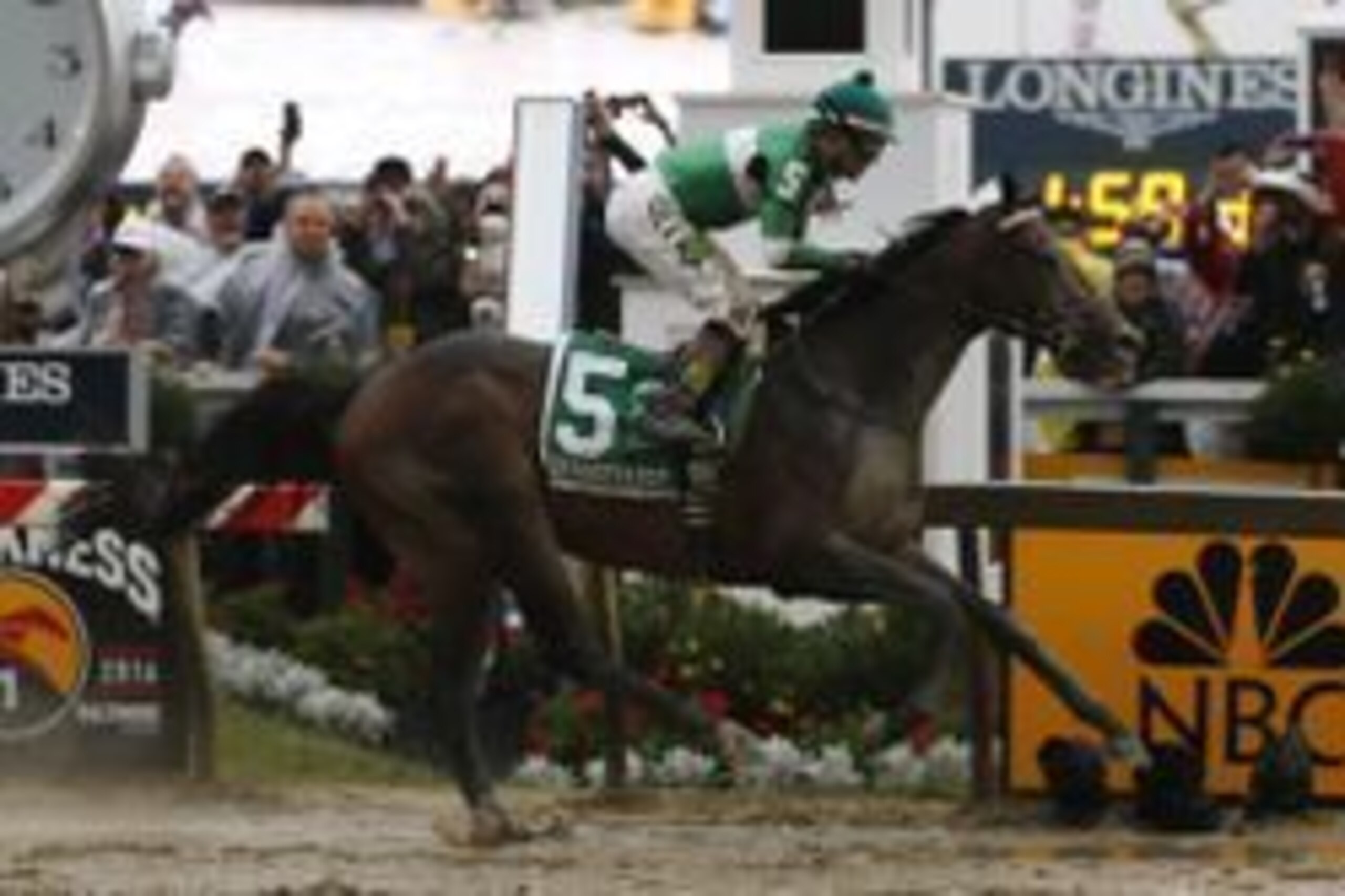 May 21, 2016; Baltimore, MD, USA; Kent Desormeaux aboard Exaggerator (5) wins the 141st running of the Preakness Stakes at Pimlico Race Course. Mandatory Credit: Amber Searls-USA TODAY Sports