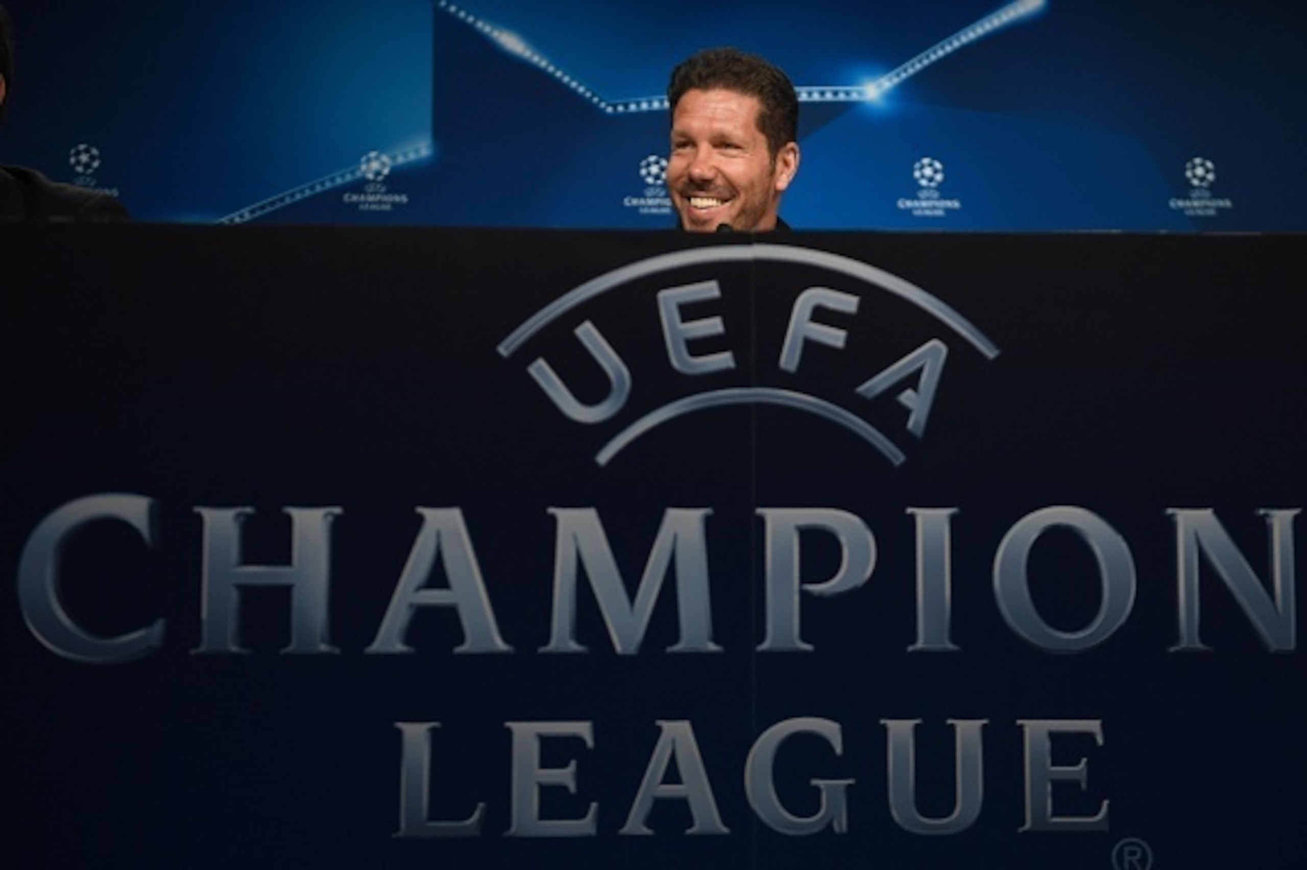 Atletico Madrid's Argentinian coach Diego Simeone smiles during a press conference at the Open Media Day at Wanda Complex training grounds in Majadahonda on May 21, 2016. / AFP / PIERRE-PHILIPPE MARCOU        (Photo credit should read PIERRE-PHILIPPE MARC