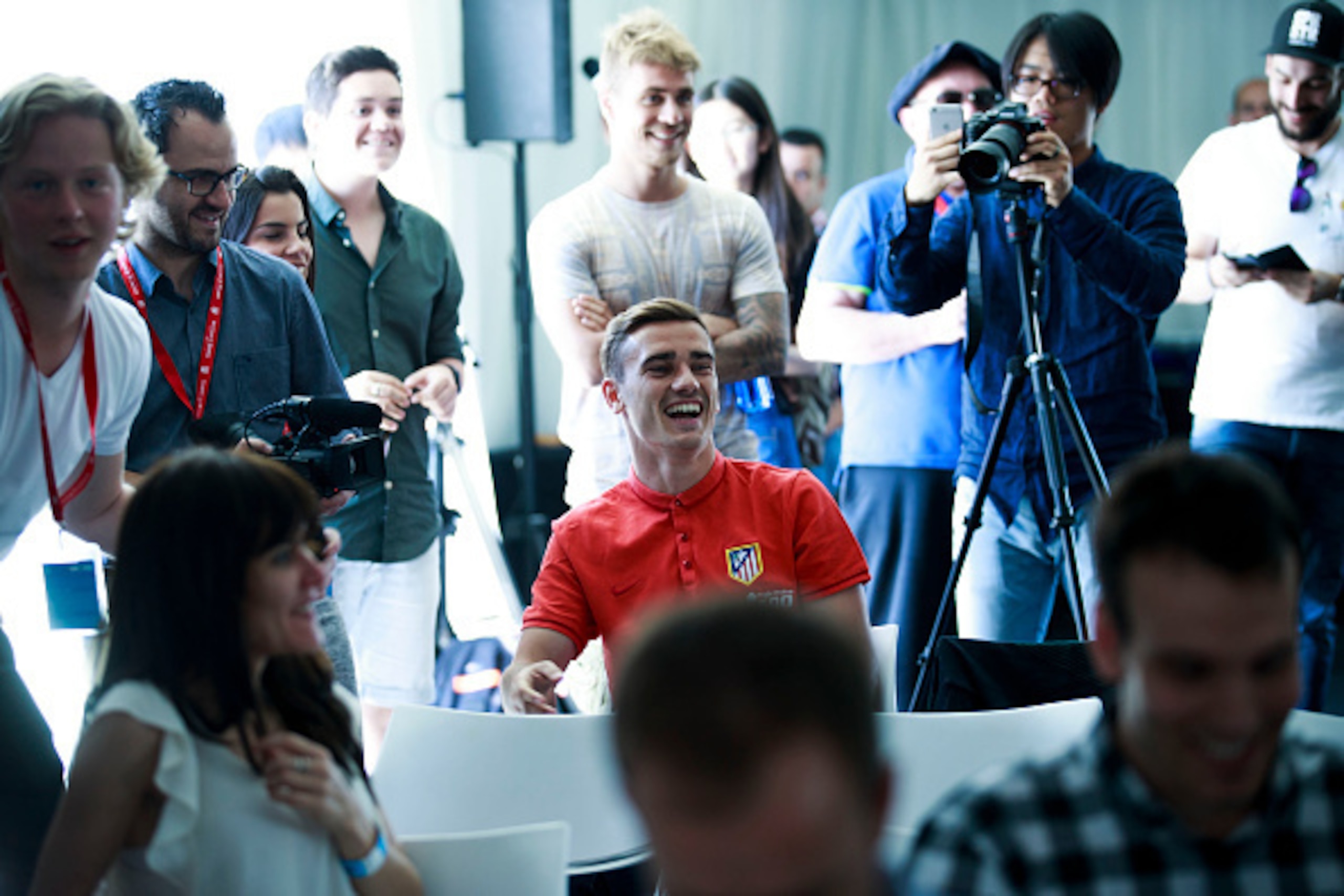 MADRID, SPAIN - MAY 21: Antoine Griezmann of Atletico de Madrid ask a question to his teammate Koke as he gives a a press conference during the Club Atletico de Madrid Open Media Day ahead of the UEFA Champions League Final match against Real Madrid CF on