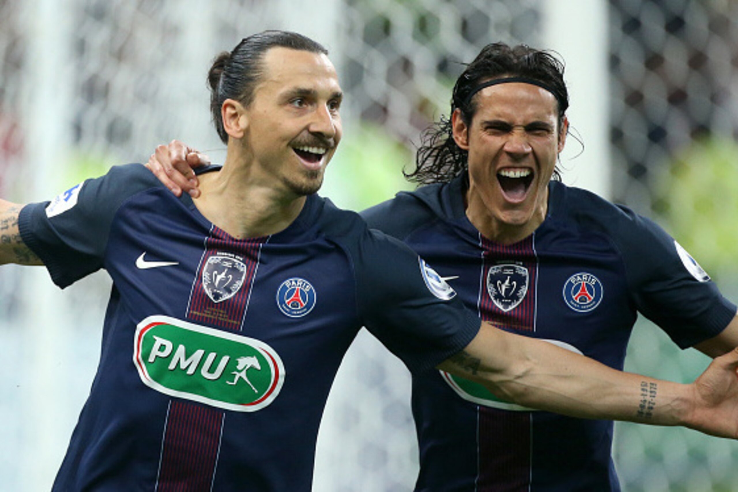 PARIS, FRANCE - MAY 21: Zlatan Ibrahimovic of PSG celebrates his goal with Edinson Cavani of PSG during the French Cup Final match between Paris Saint-Germain (PSG) and Olympique de Marseille (OM) at Stade de France on May 21, 2016 in Saint-Denis nearby P