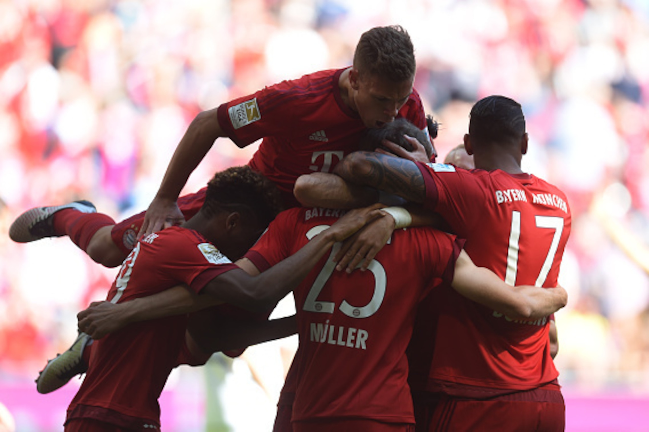 (L-R) Bayern Munich's French defender Kingsley Coman, Bayern Munich's midfielder Joshua Kimmich, Bayern Munich's striker Thomas Mueller, Bayern Munich's defender Serdar Tasci and Bayern Munich's defender Jerome Boateng celebrate after the first goal durin