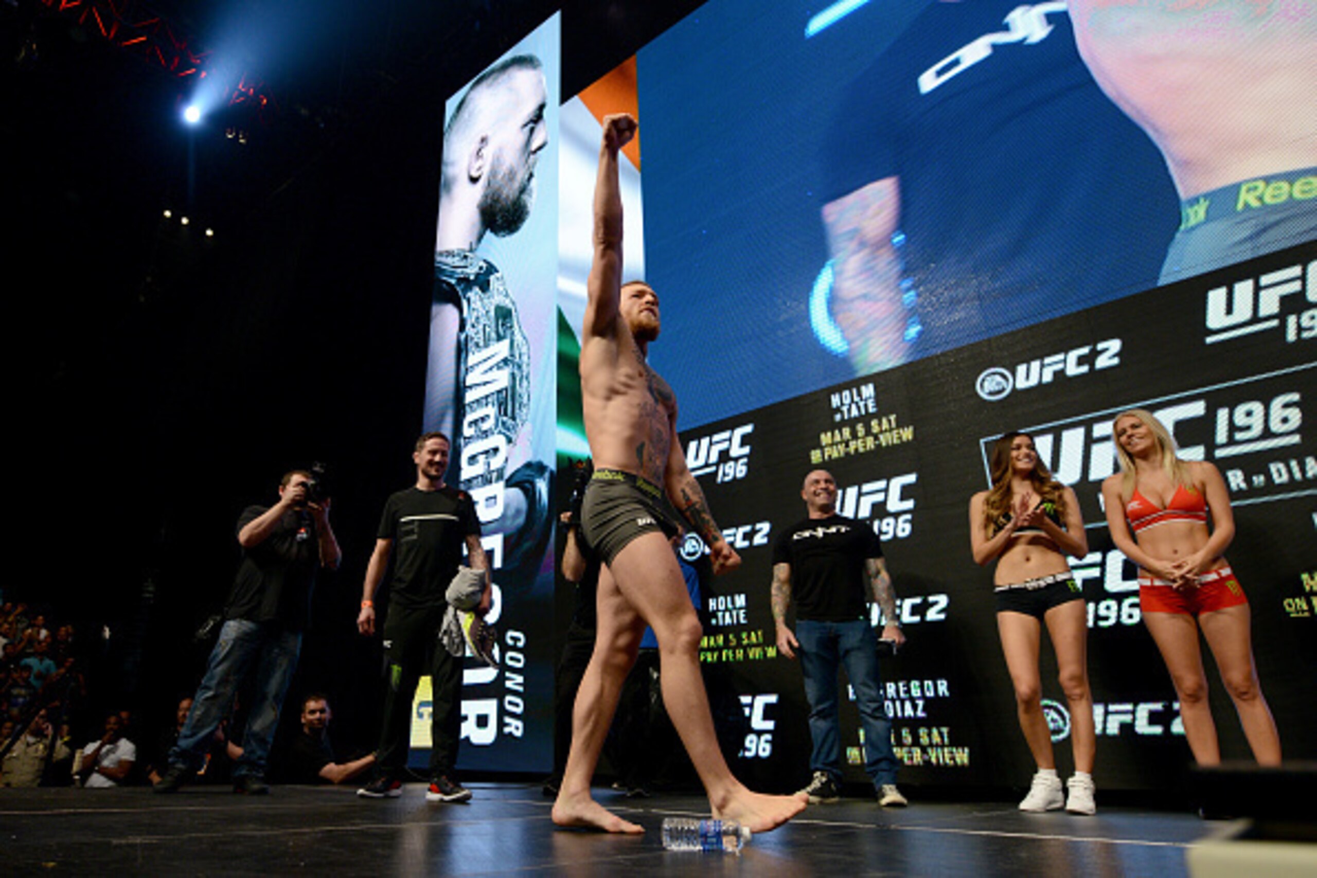 LAS VEGAS, NEVADA - MARCH 04:  Conor McGregor of Ireland interacts with fans onstage during the UFC 196 weigh-in at the MGM Grand Garden Arena on March 4, 2016 in Las Vegas, Nevada. (Photo by Jeff Bottari/Zuffa LLC/Zuffa LLC via Getty Images)