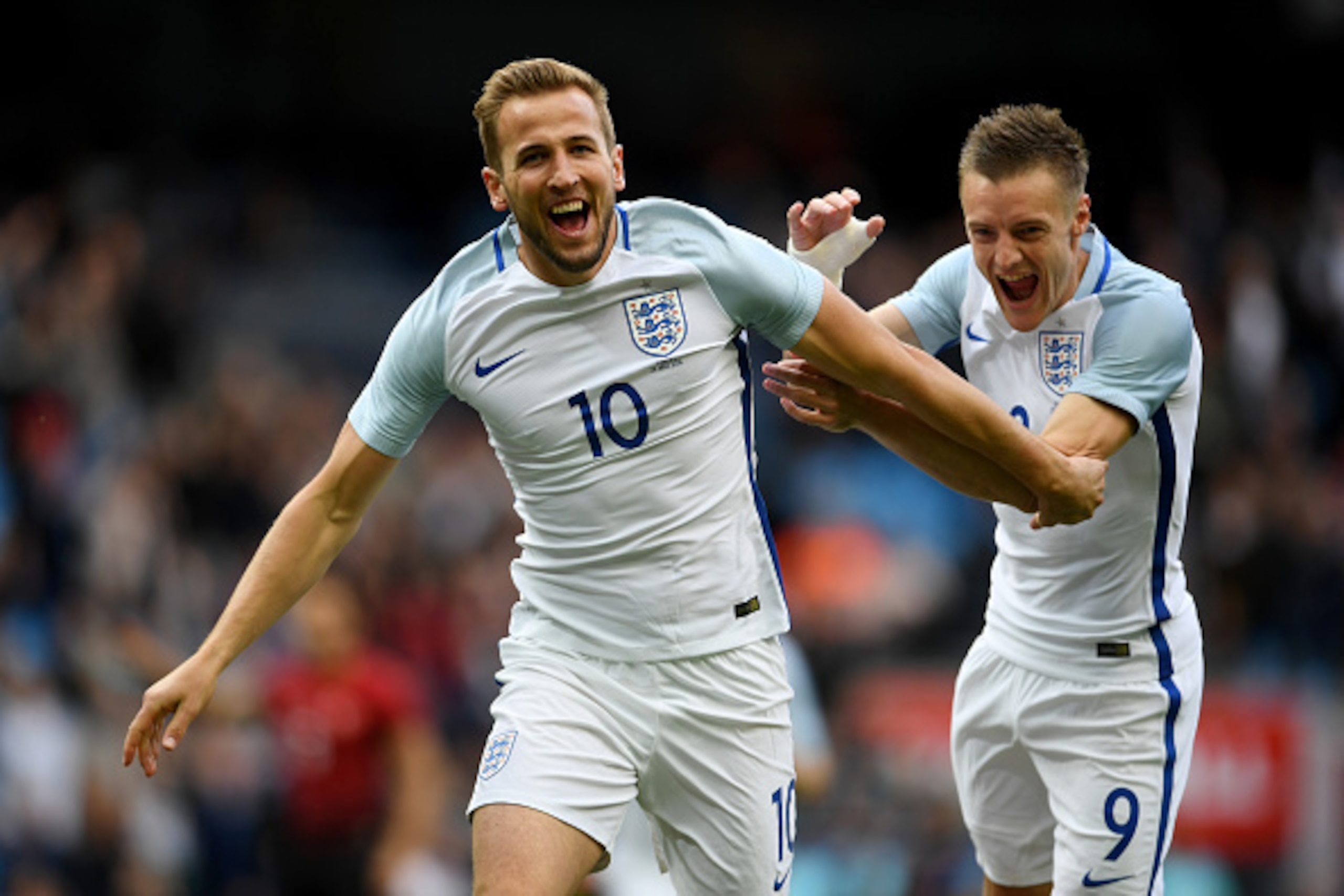 MANCHESTER, ENGLAND - MAY 22:  Harry Kane of England celebrates with Jamie Vardy of England after he scored the opening goal during the International Friendly match between England and Turkey at Etihad Stadium on May 22, 2016 in Manchester, England.  (Pho