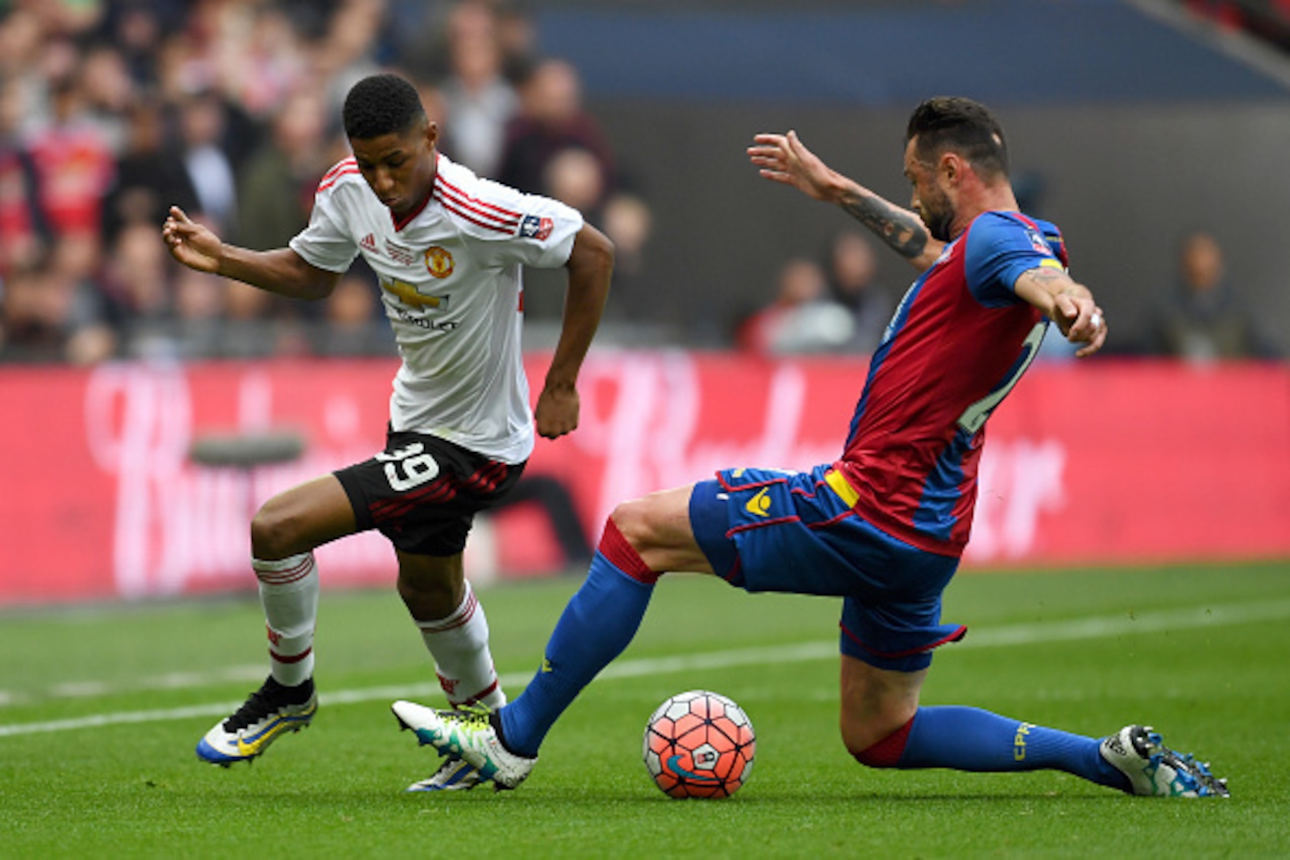 LONDON, ENGLAND - MAY 21:  Marcus Rashford of Manchester United is tackled by Damien Delaney of Crystal Palace during The Emirates FA Cup Final match between Manchester United and Crystal Palace at Wembley Stadium on May 21, 2016 in London, England.  (Pho