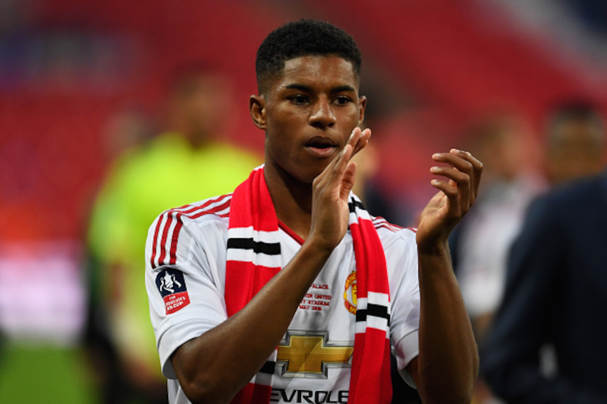 LONDON, ENGLAND - MAY 21:  Marcus Rashford of Manchester United applauds the fans after winning The Emirates FA Cup Final match between Manchester United and Crystal Palace at Wembley Stadium on May 21, 2016 in London, England. Man Utd won 2-1 after extra