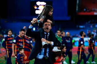 MADRID, SPAIN - MAY 22: Head coach Luis Enrique Martinez (L) of FC Barcelona celebrates after winning the Copa del Rey Final match between FC Barcelona and Sevilla FC at Vicente Calderon Stadium on May 22, 2016 in Madrid, Spain. (Photo by Gonzalo Arroyo M