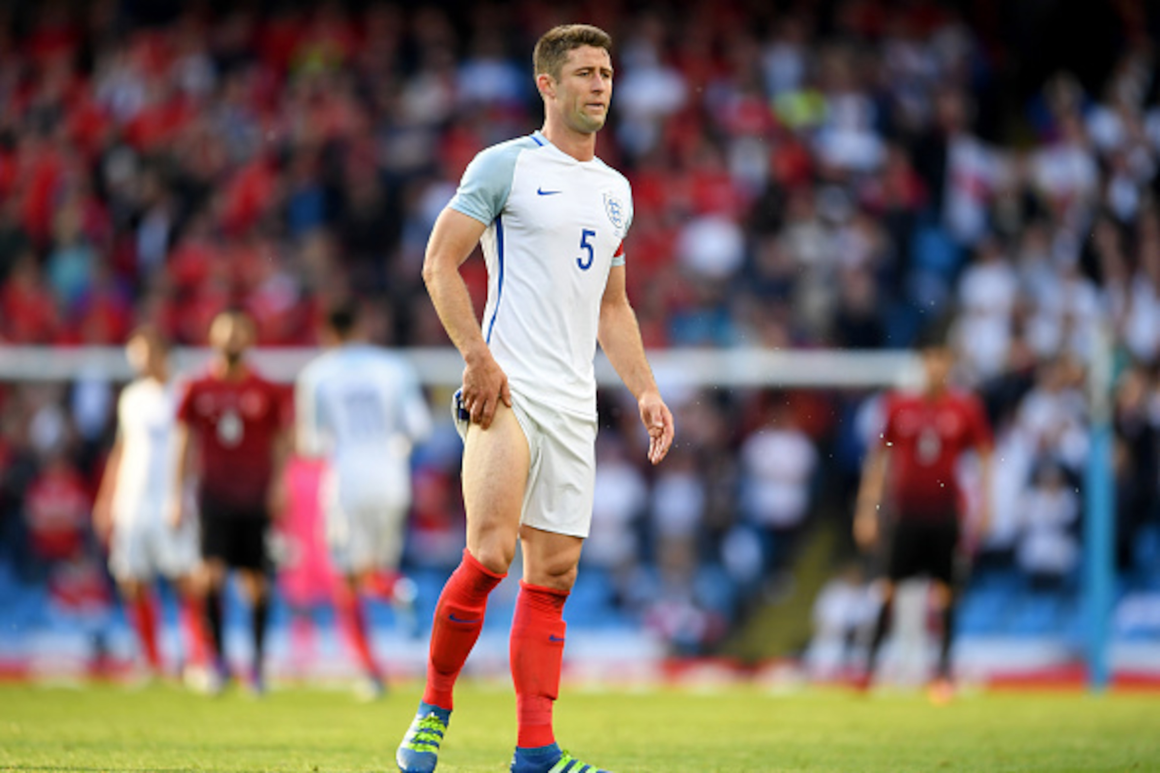MANCHESTER, ENGLAND - MAY 22:  Gary Cahill of England holds his thigh during the International Friendly match between England and Turkey at Etihad Stadium on May 22, 2016 in Manchester, England.  (Photo by Laurence Griffiths/Getty Images)