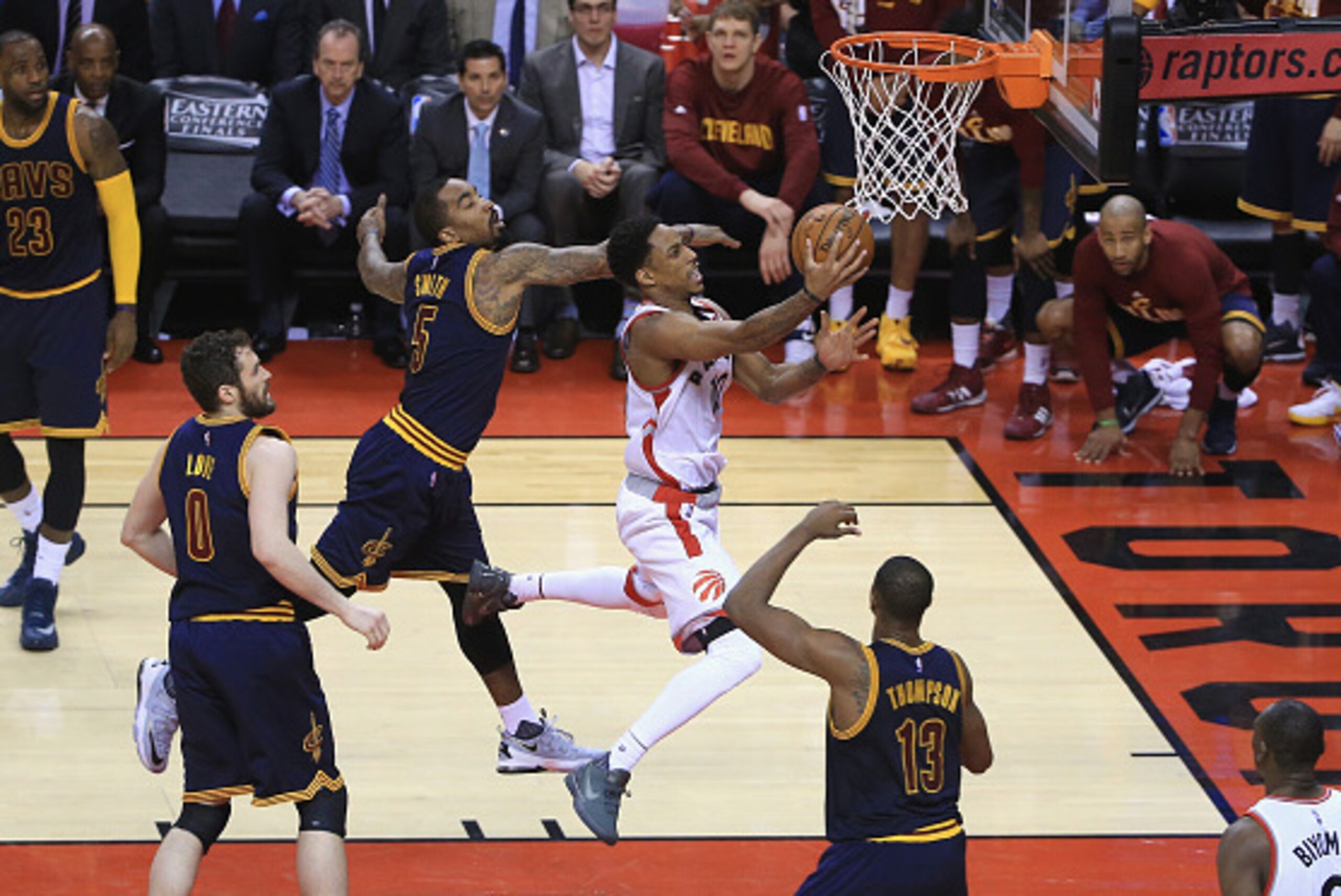 TORONTO, ON - MAY 21: DeMar DeRozan #10 of the Toronto Raptors shoots the ball against J.R. Smith #5 of the Cleveland Cavaliers during the second half in game three of the Eastern Conference Finals during the 2016 NBA Playoffs at Air Canada Centre on May TORONTO, ON - MAY 21: DeMar DeRozan #10 of the Toronto Raptors shoots the ball against J.R. Smith #5 of the Cleveland Cavaliers during the second half in game three of the Eastern Conference Finals during the 2016 NBA Playoffs at Air Canada Centre on May