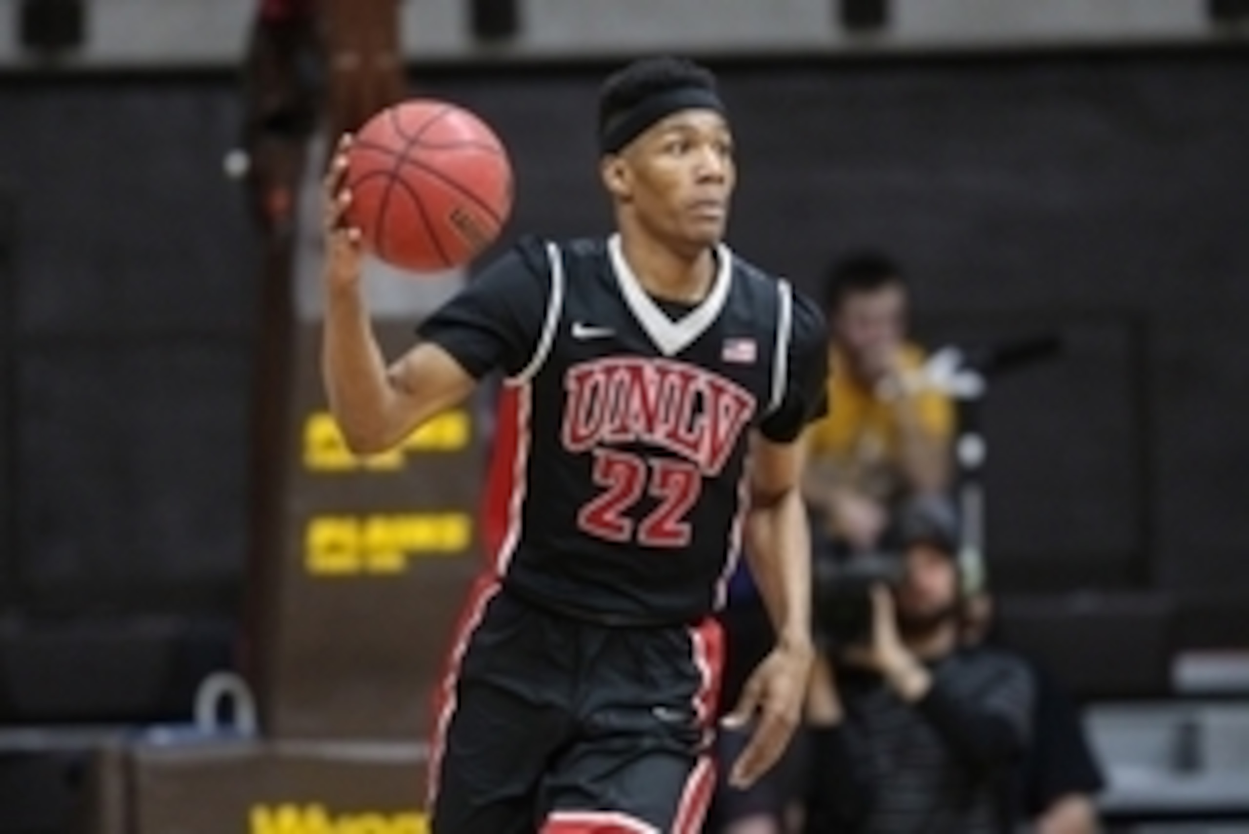 Jan 9, 2016; Laramie, WY, USA; UNLV Runnin' Rebels guard Patrick McCaw (22) brings the ball up court against the Wyoming Cowboys during the first half at Arena-Auditorium. The Cowboys beat the Runnin' Rebels 59-57. Mandatory Credit: Troy Babbitt-USA TODAY