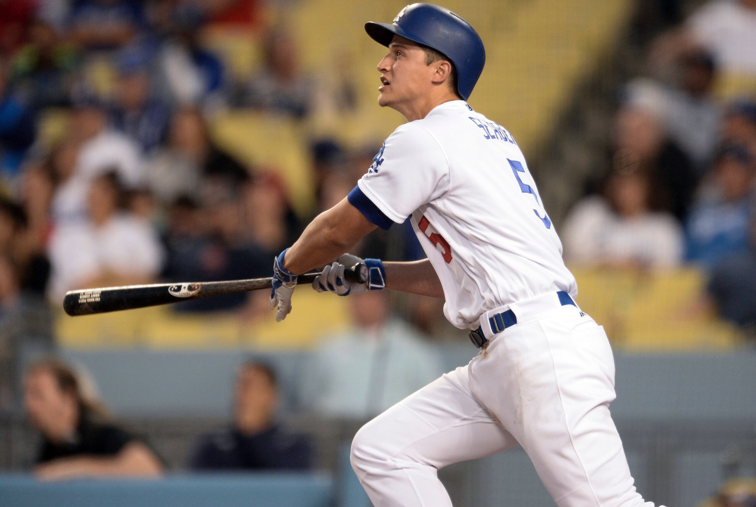 May 15, 2016; Los Angeles, CA, USA; Los Angeles Dodgers shortstop Corey Seager (5) watches his solo home run against the St. Louis Cardinals leave the park during the 8th inning at Dodger Stadium. Mandatory Credit: Robert Hanashiro-USA TODAY Sports