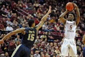 Jan 23, 2016; Tallahassee, FL, USA; Florida State Seminoles guard Malik Beasley (5) shoots the ball past Pittsburgh Panthers guard Sterling Smith (15) during the second half at the Donald L. Tucker Center. Mandatory Credit: Melina Vastola-USA TODAY Sports