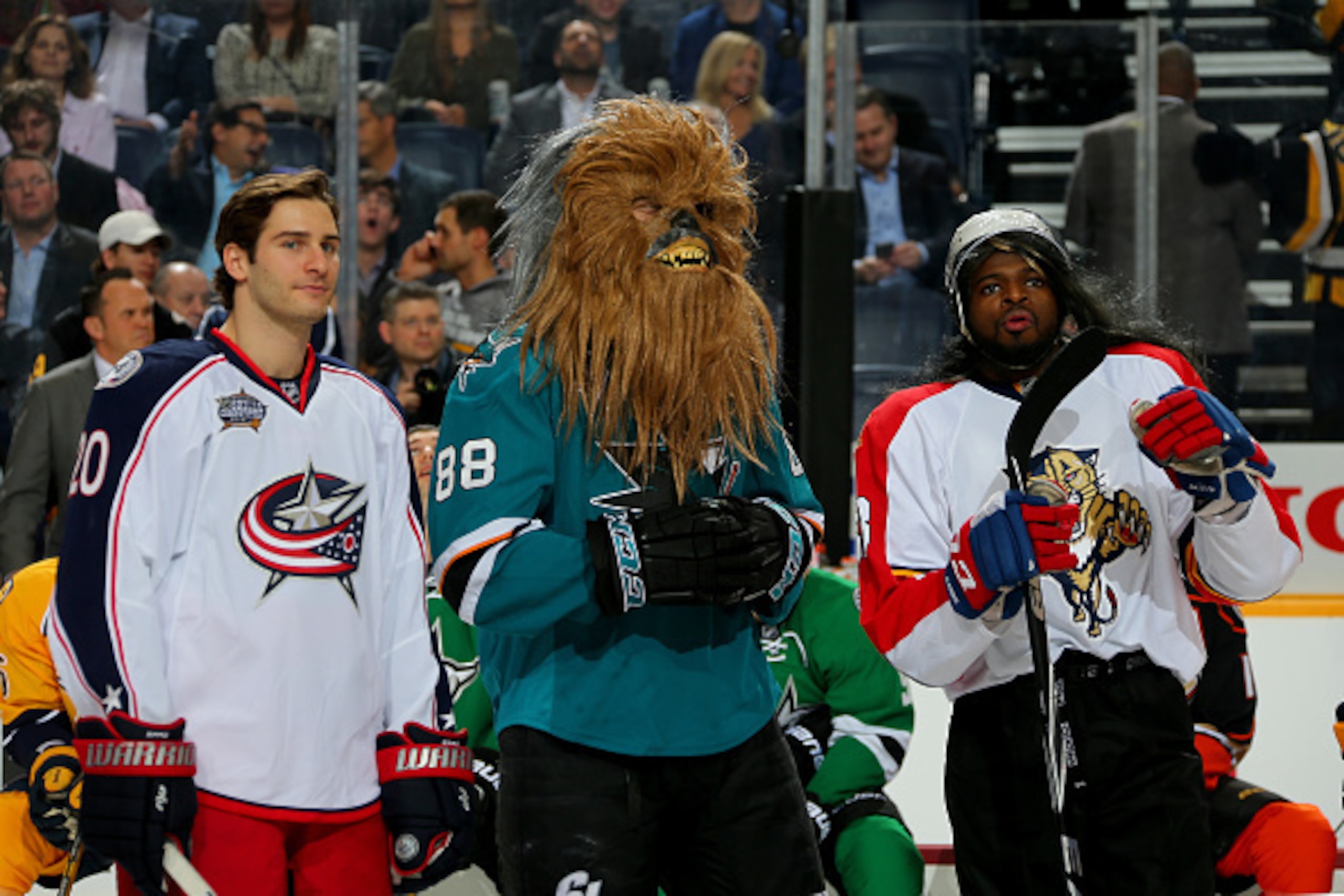 NASHVILLE, TN - JANUARY 30:  (L-R) Brandon Saad #20 of the Columbus Blue Jackets, Brent Burns #88 of the San Jose Sharks, and P.K. Subban #76 of the Montreal Canadiens look on in the DraftKings NHL Accuracy Shooting during the 2016 Honda NHL All-Star Skil