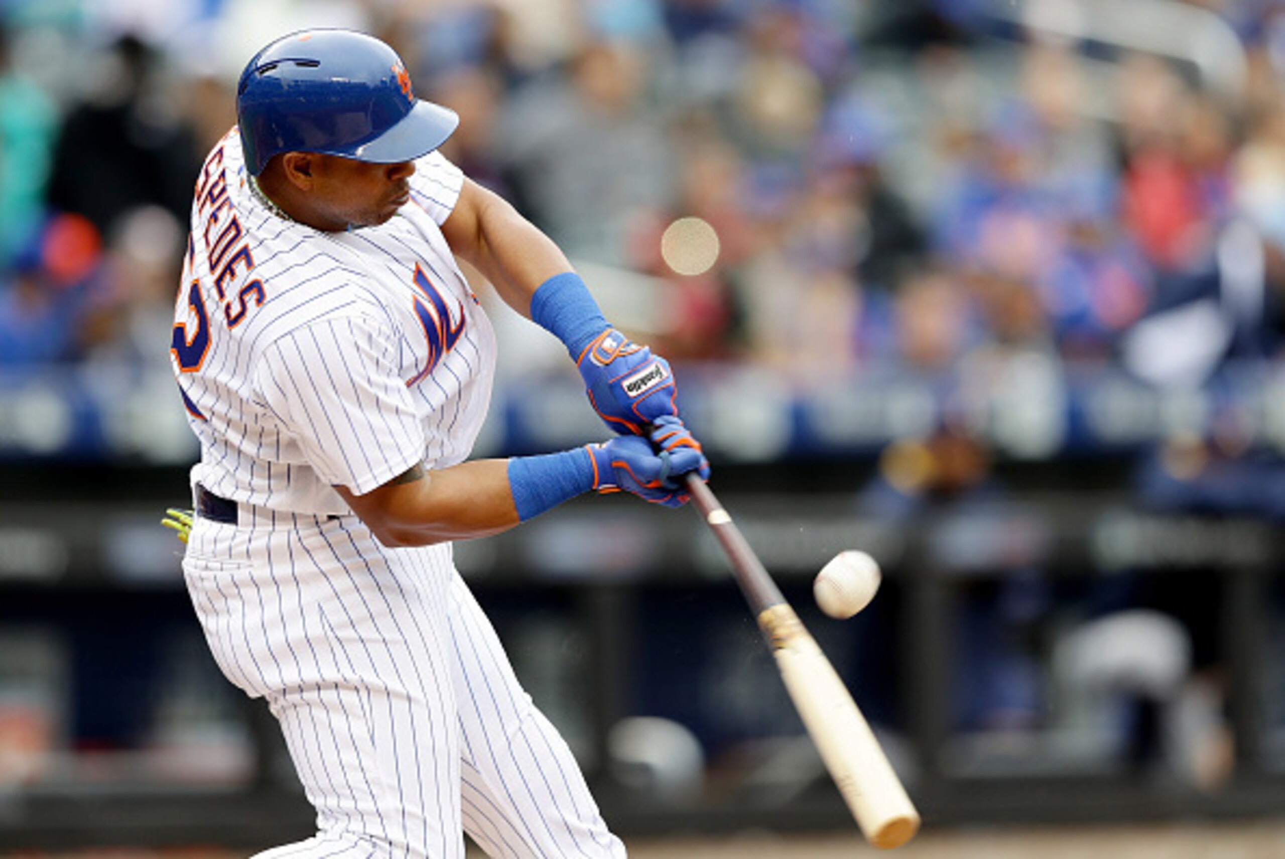 NEW YORK, NY - MAY 21:  Yoenis Cespedes #52 of the New York Mets hits a single in the fourth inning against the Milwaukee Brewers at Citi Field on May 21, 2016 in the Flushing neighborhood of the Queens borough of New York City.  (Photo by Elsa/Getty Imag