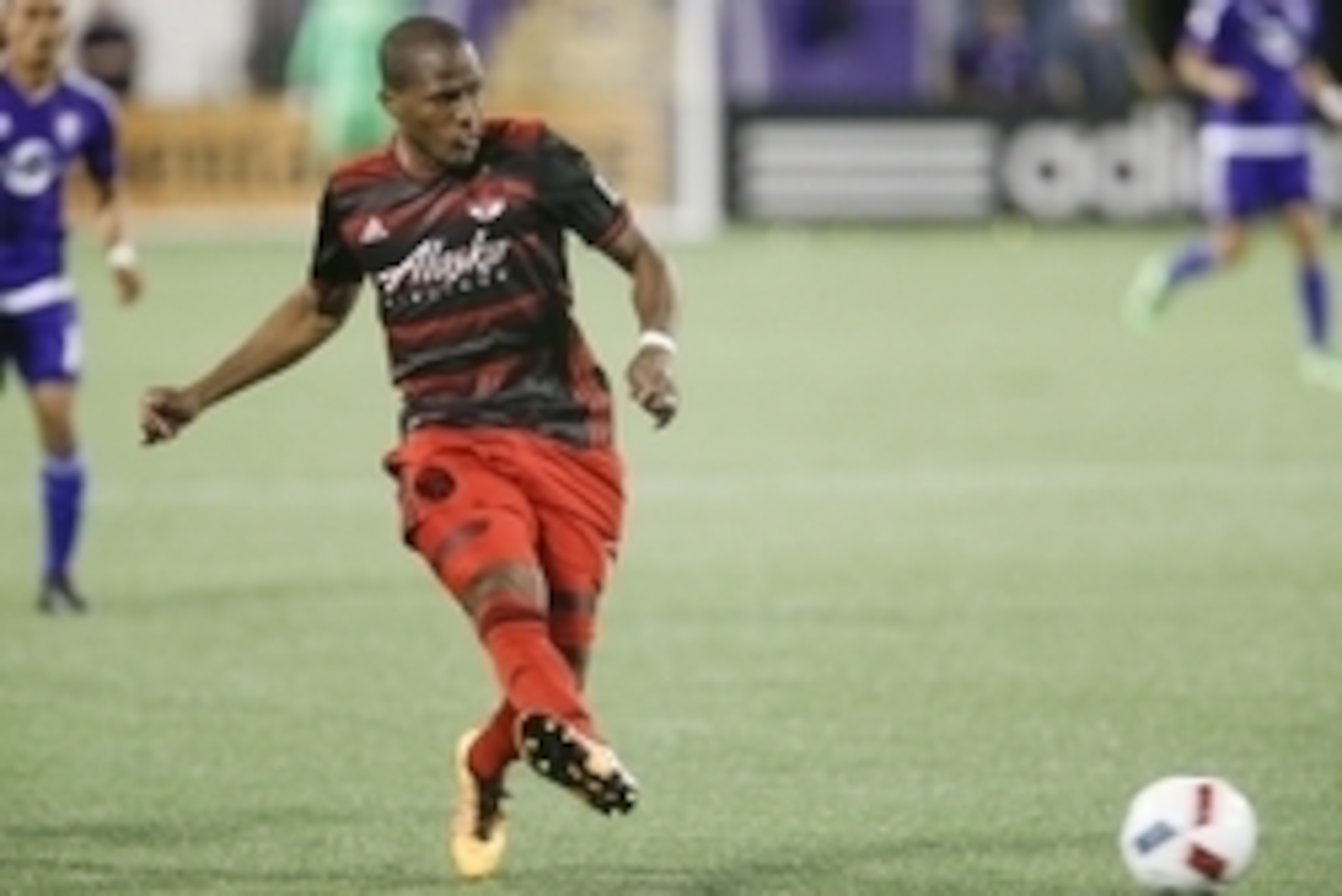 Apr 3, 2016; Orlando, FL, USA; Portland Timbers midfielder Darlington Nagbe (6) kicks the ball back to his goalie during the second half of a soccer match against the Orlando City FC at Orlando Citrus Bowl Stadium. Orlando won 4-1. Mandatory Credit: Reinh