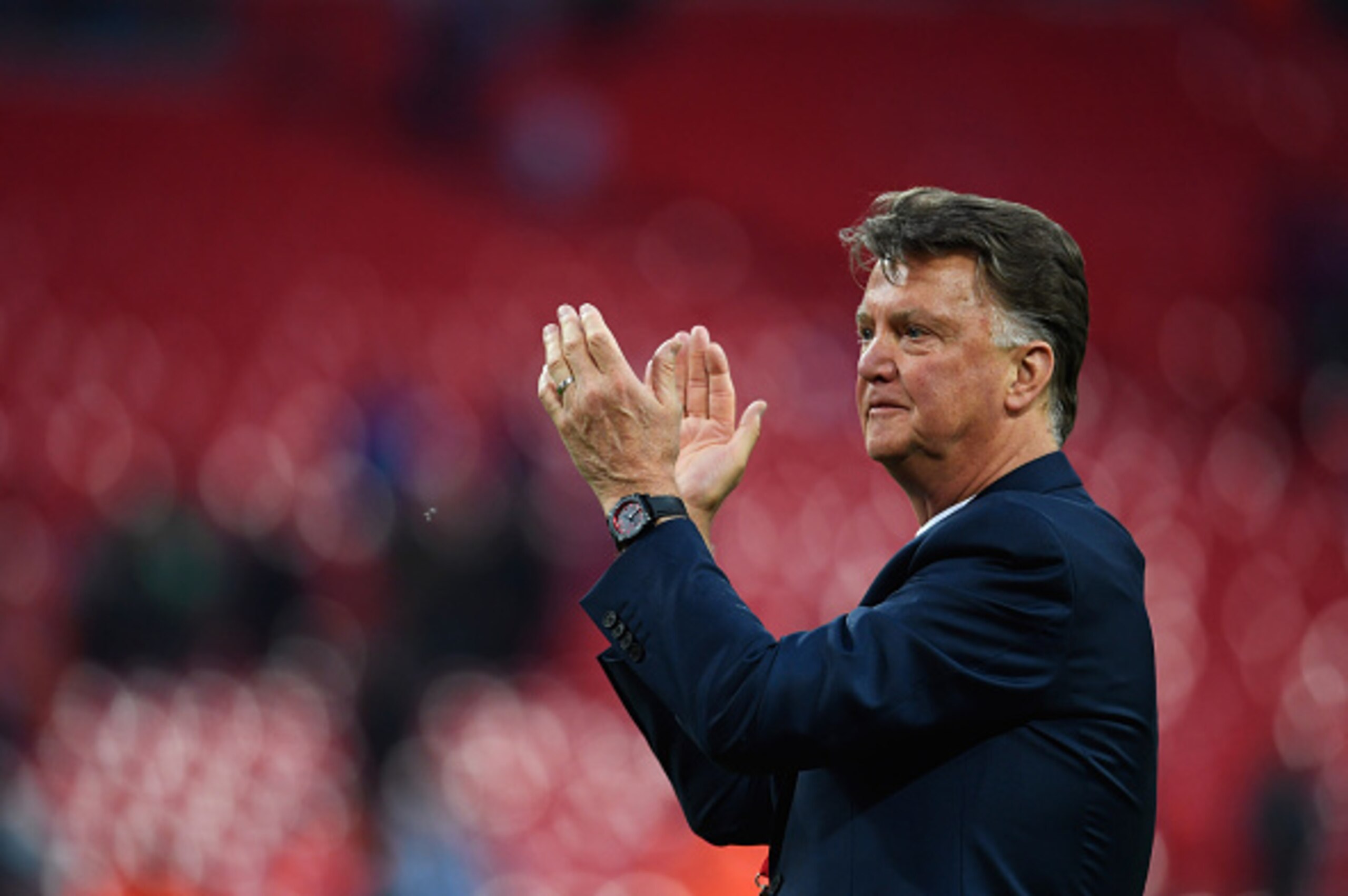 LONDON, ENGLAND - MAY 21:  Louis van Gaal Manager of Manchester United applauds the fans after winning The Emirates FA Cup Final match between Manchester United and Crystal Palace at Wembley Stadium on May 21, 2016 in London, England. Man Utd won 2-1 afte