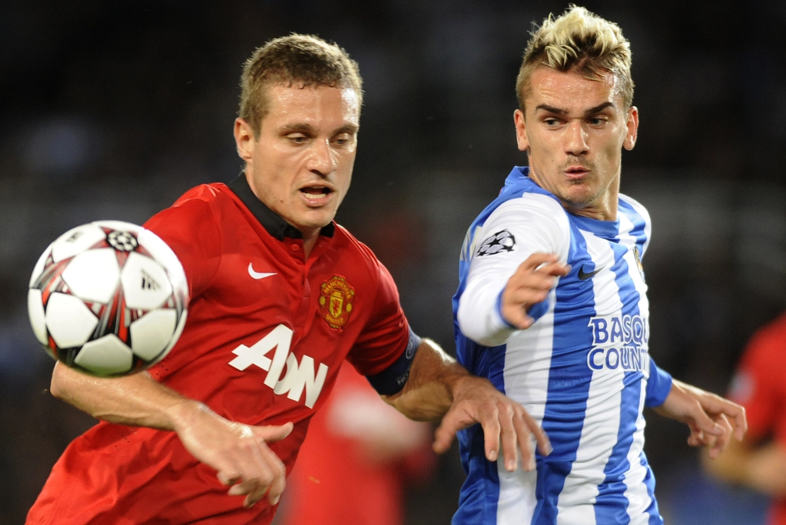 Griezmann up against Manchester United's Nemanja Vidic in 2013 Griezmann up against Manchester United's Nemanja Vidic in 2013