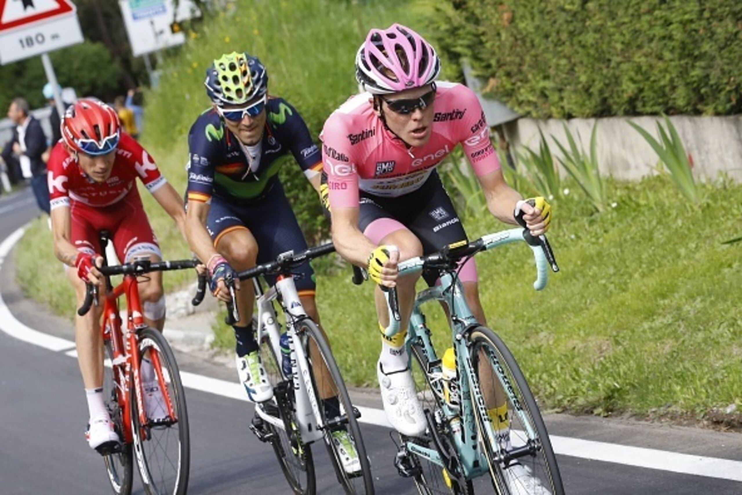 Pink jersey, Dutch Steven Kruijswijk (R) of team Lotto NL rides ahead of Spain's Alejandro Valverde (C) of team Movistar and Russia's Ilnur Zakarin of team Katusha during the 16th stage of the 99th Giro d'Italia, Tour of Italy, from Bressanone / Brixen to