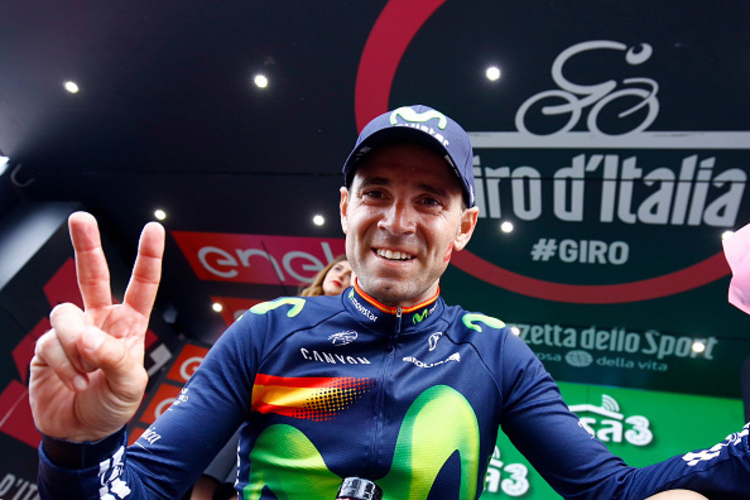 Spain's Alejandro Valverde of team Movistar celebrates on the podium after winning the 16th stage of the 99th Giro d'Italia, Tour of Italy, from Bressanone / Brixen to Andalo on May 24, 2016.  / AFP / LUK BENIES        (Photo credit should read LUK BENIES