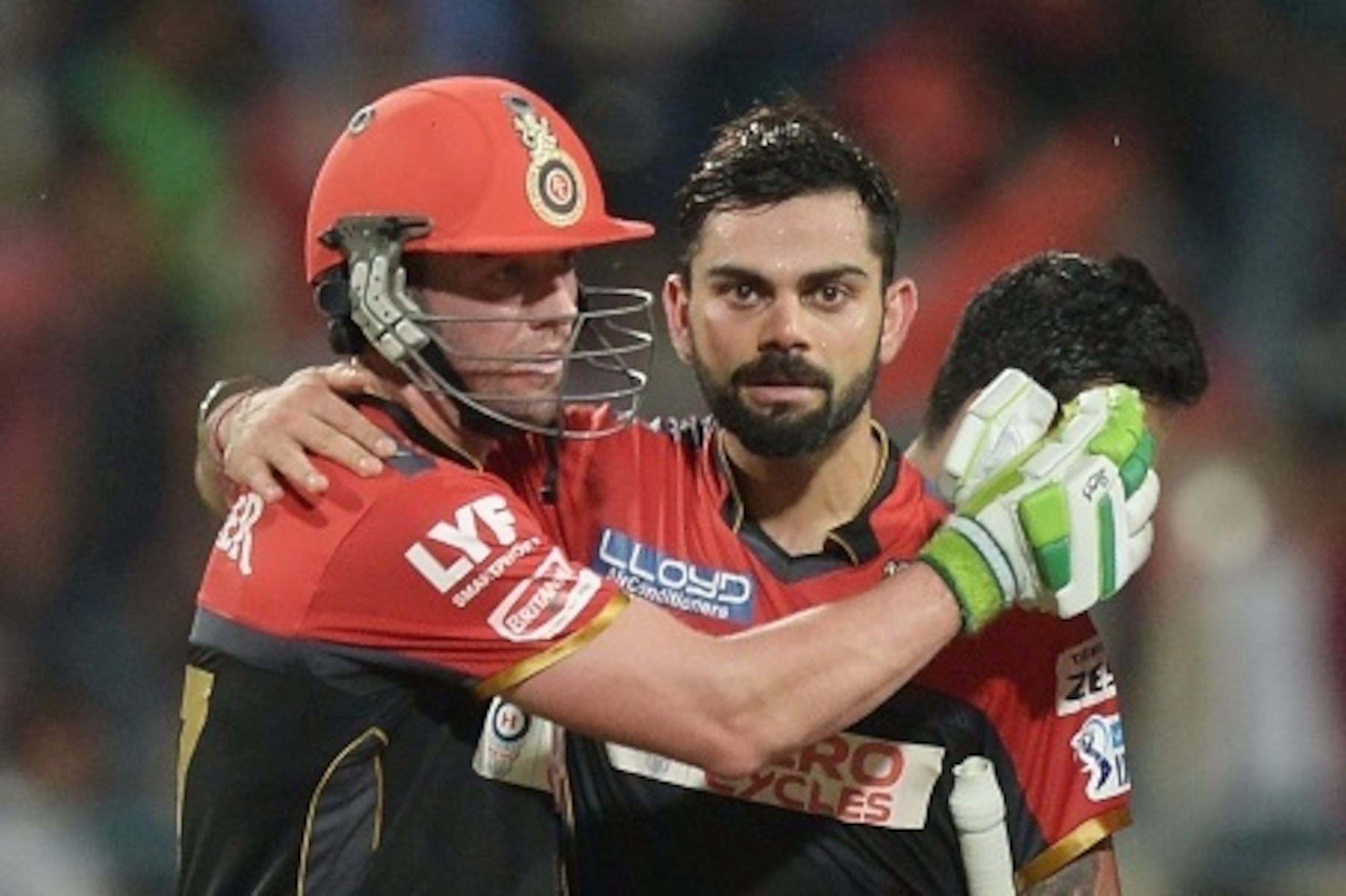 Royal Challengers Bangalore captain Virat Kohli (R) and AB de Villiers celebrate after winning the match after the 2016 Indian Premier League (IPL) Twenty20 cricket match between Kolkata Knight Riders and Royal Challengers Bangalore at the Eden Gardens Cr Royal Challengers Bangalore captain Virat Kohli (R) and AB de Villiers celebrate after winning the match after the 2016 Indian Premier League (IPL) Twenty20 cricket match between Kolkata Knight Riders and Royal Challengers Bangalore at the Eden Gardens Cr