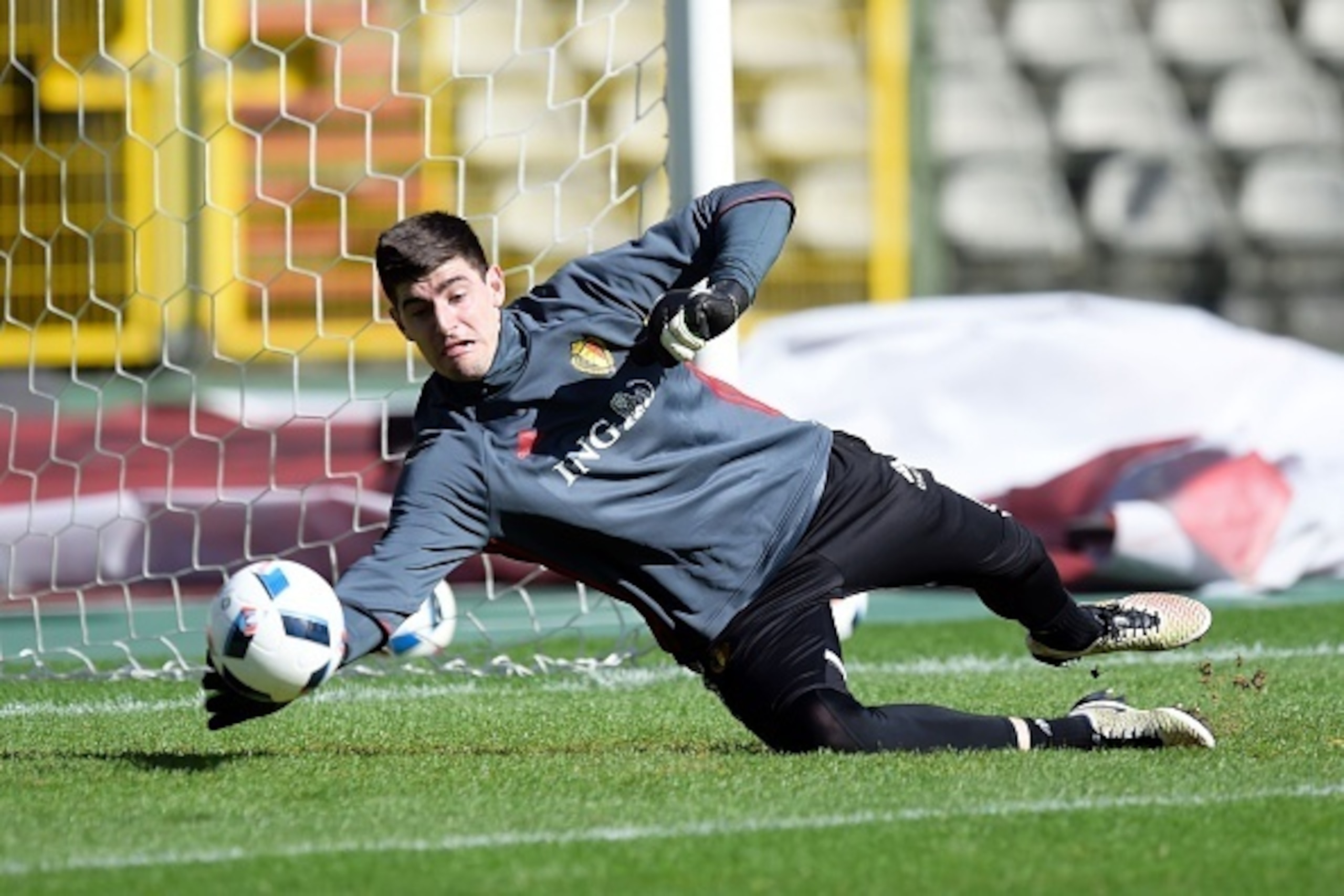 Goalkeeper of Belgium Thibaut Courtois stops the ball on March 27, 2016 at the King Baudouin Stadium in Brussels, during a closed training session as part of the preparation prior to the friendly game against Portugal.
The Red Devils will play a friendl Goalkeeper of Belgium Thibaut Courtois stops the ball on March 27, 2016 at the King Baudouin Stadium in Brussels, during a closed training session as part of the preparation prior to the friendly game against Portugal.
The Red Devils will play a friendl