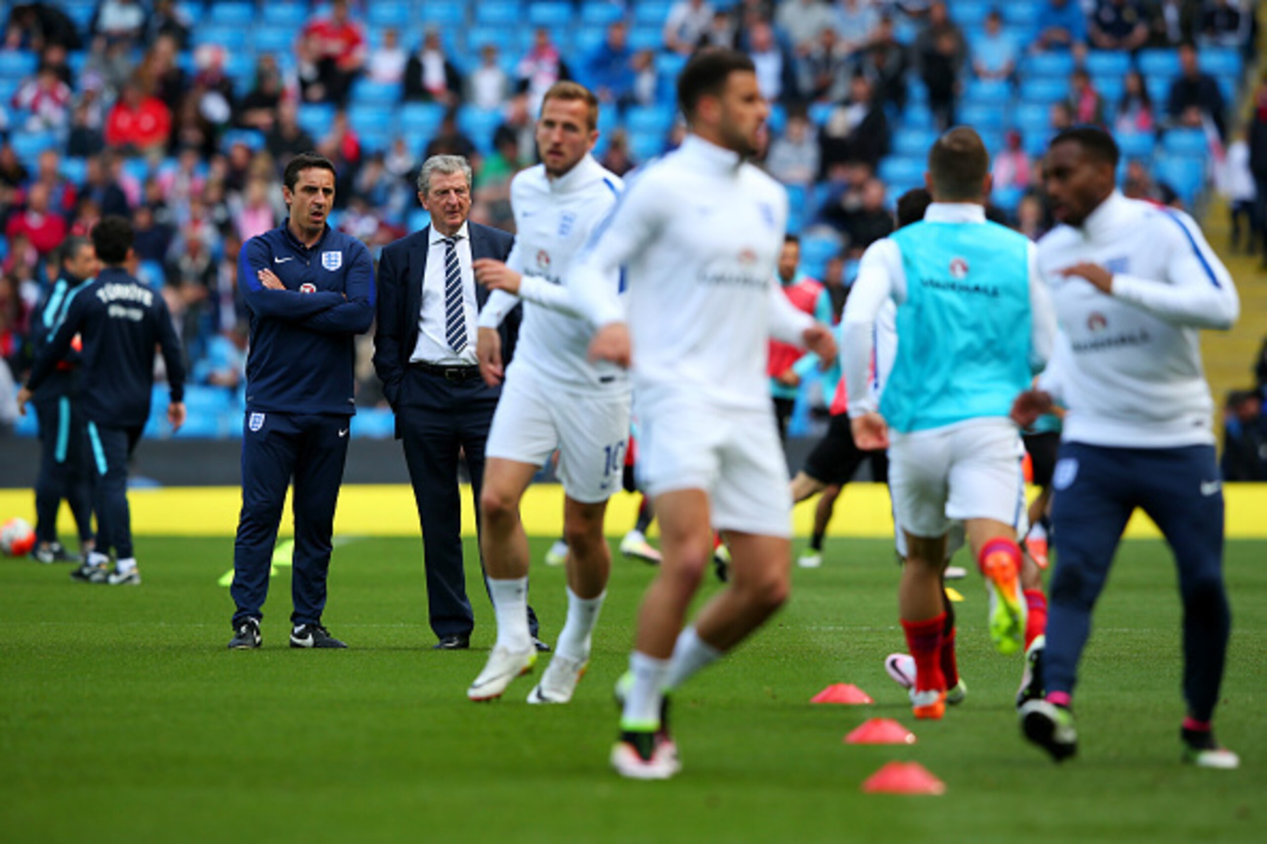 MANCHESTER, ENGLAND - MAY 22:  Roy Hodgson, manager of England and Assistant Manager Gary Neville look on during the International Friendly match between England and Turkey at Etihad Stadium on May 22, 2016 in Manchester, England.  (Photo by Alex Livesey/