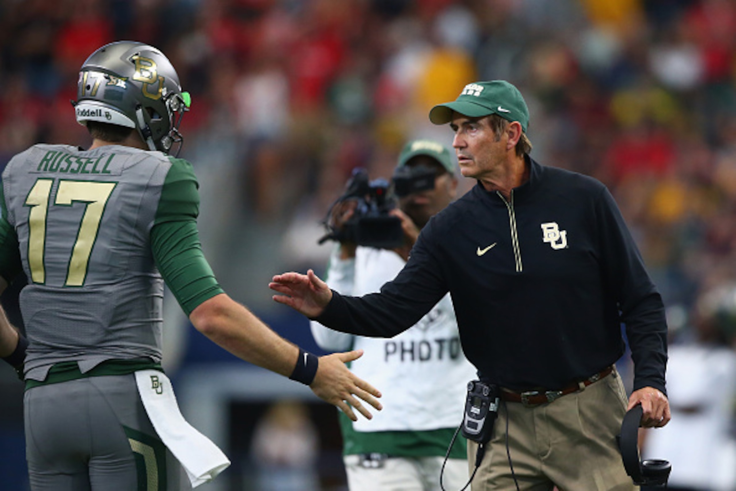 ARLINGTON, TX - OCTOBER 03:  Seth Russell #17 of the Baylor Bears celebrates his touchdown with Art Briles in the second quarter against the Texas Tech Red Raiders at AT&T Stadium on October 3, 2015 in Arlington, Texas.  (Photo by Ronald Martinez/Getty Im