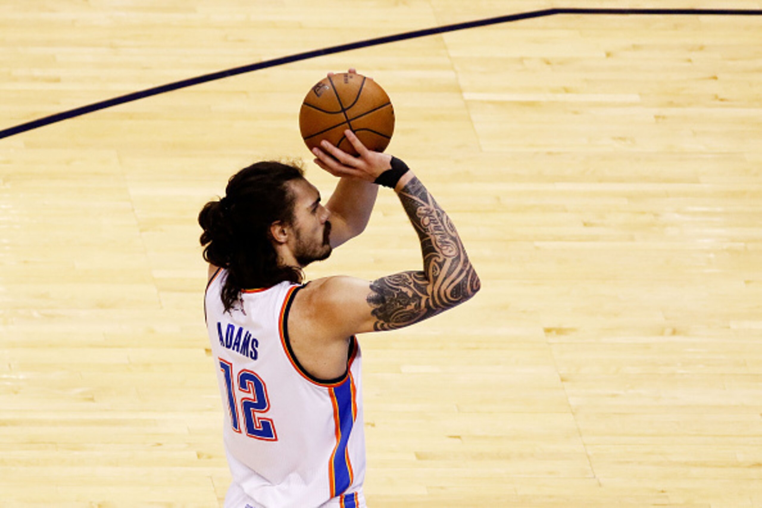 OKLAHOMA CITY, OK - MAY 24:  Steven Adams #12 of the Oklahoma City Thunder shoots against the Golden State Warriors in the first half in game four of the Western Conference Finals during the 2016 NBA Playoffs at Chesapeake Energy Arena on May 24, 2016 in 