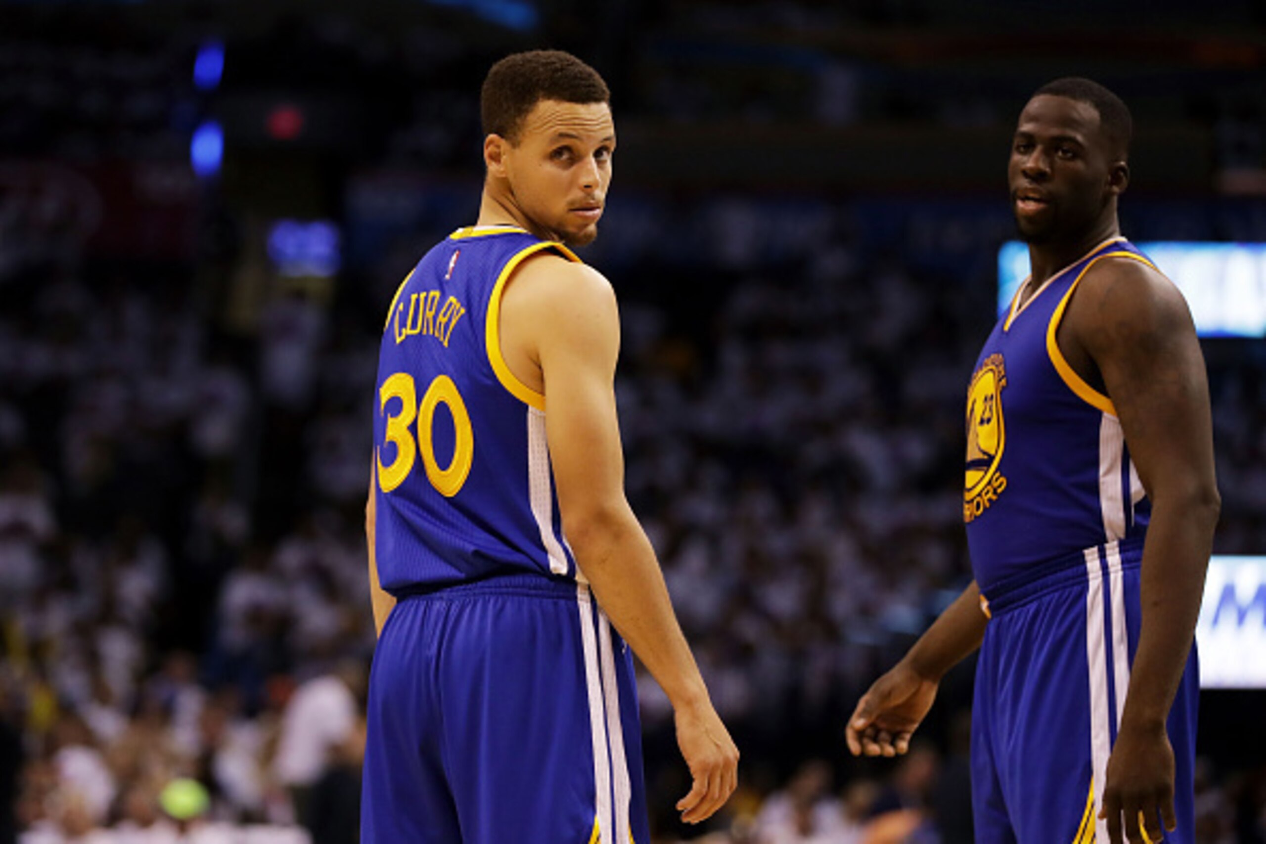 OKLAHOMA CITY, OK - MAY 24:  Stephen Curry #30 and Draymond Green #23 of the Golden State Warriors react in the third quarter against the Oklahoma City Thunder in game four of the Western Conference Finals during the 2016 NBA Playoffs at Chesapeake Energy