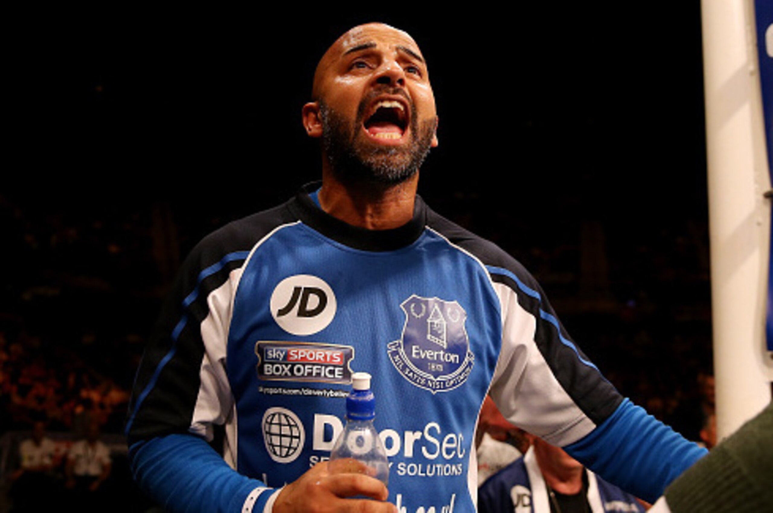 LIVERPOOL, ENGLAND - NOVEMBER 22:  Tony Bellew's trainer David Coldwell shouts instructions during the Eliminator for the WBO World Cruiserqweight Championship with Nathan Cleverly at Liverpool Echo Arena on November 22, 2014 in Liverpool, England.  (Phot