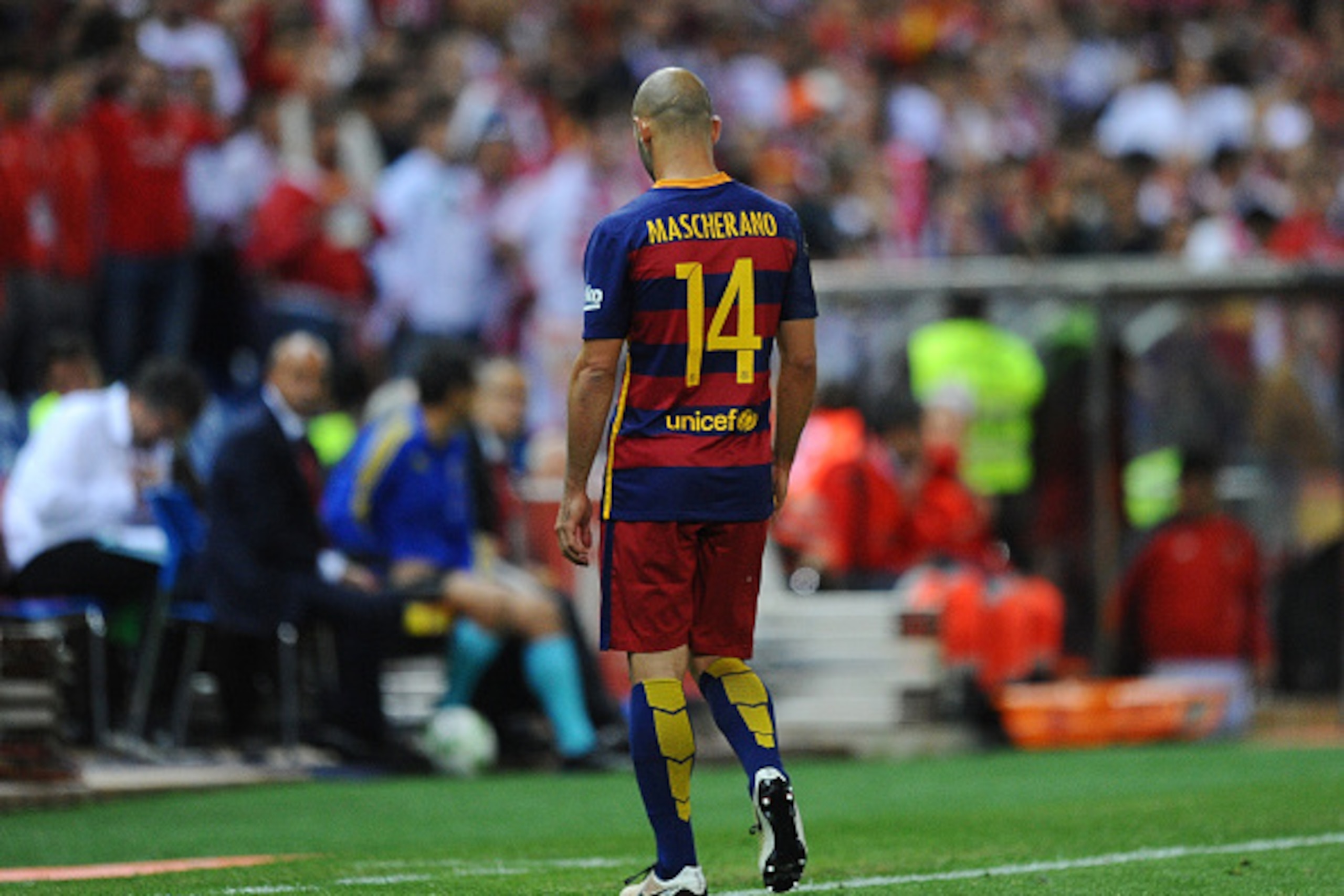 MADRID, SPAIN - MAY 22:  Javier Mascherano of FC Barcelona leaves the field after he was handed a red card by referee Carlos del Cerro Grande during the Copa del Rey Final between Barcelona and Sevilla at Vicente Calderon Stadium    on May 22, 2016 in Mad