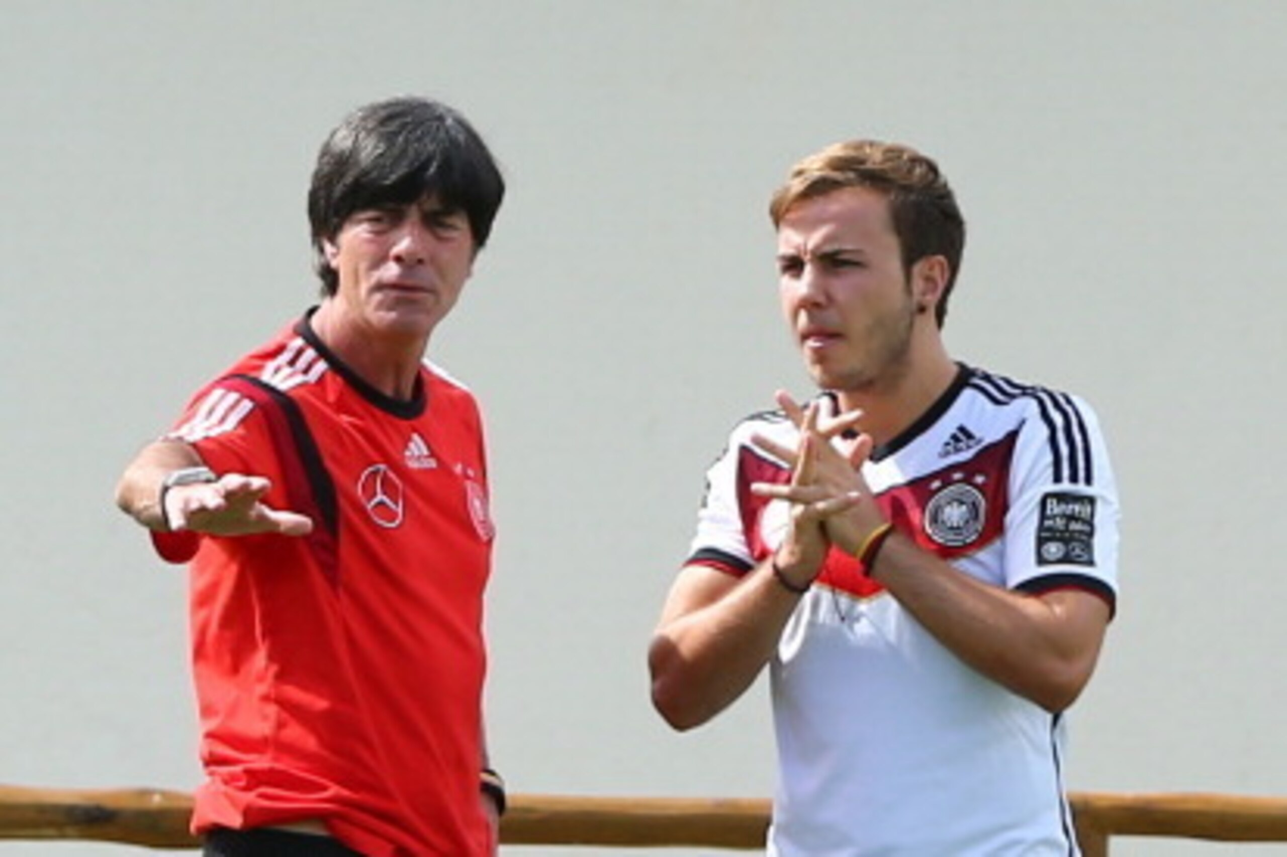 SANTO ANDRE, BRAZIL - JULY 05:  Joachim Loew (L), head coach of Germany tlks to Mario Goetze during the German national team training at Campo Bahia on July 5, 2014 in Santo Andre, Brazil.  (Photo by Martin Rose/Getty Images)