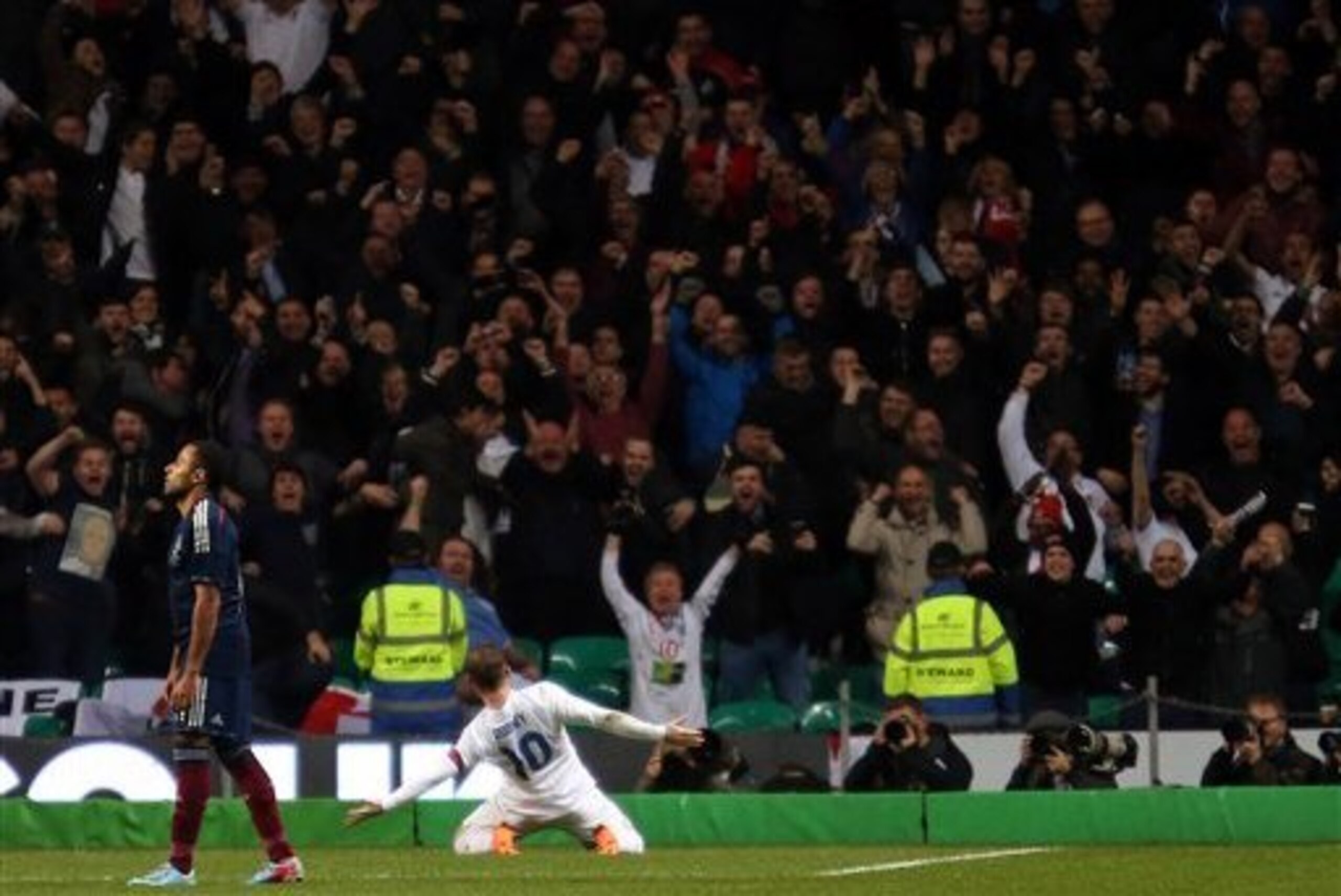Rooney sends the travelling England fans wild after scoring one of two goals in a 3-1 win over neighbours Scotland.
