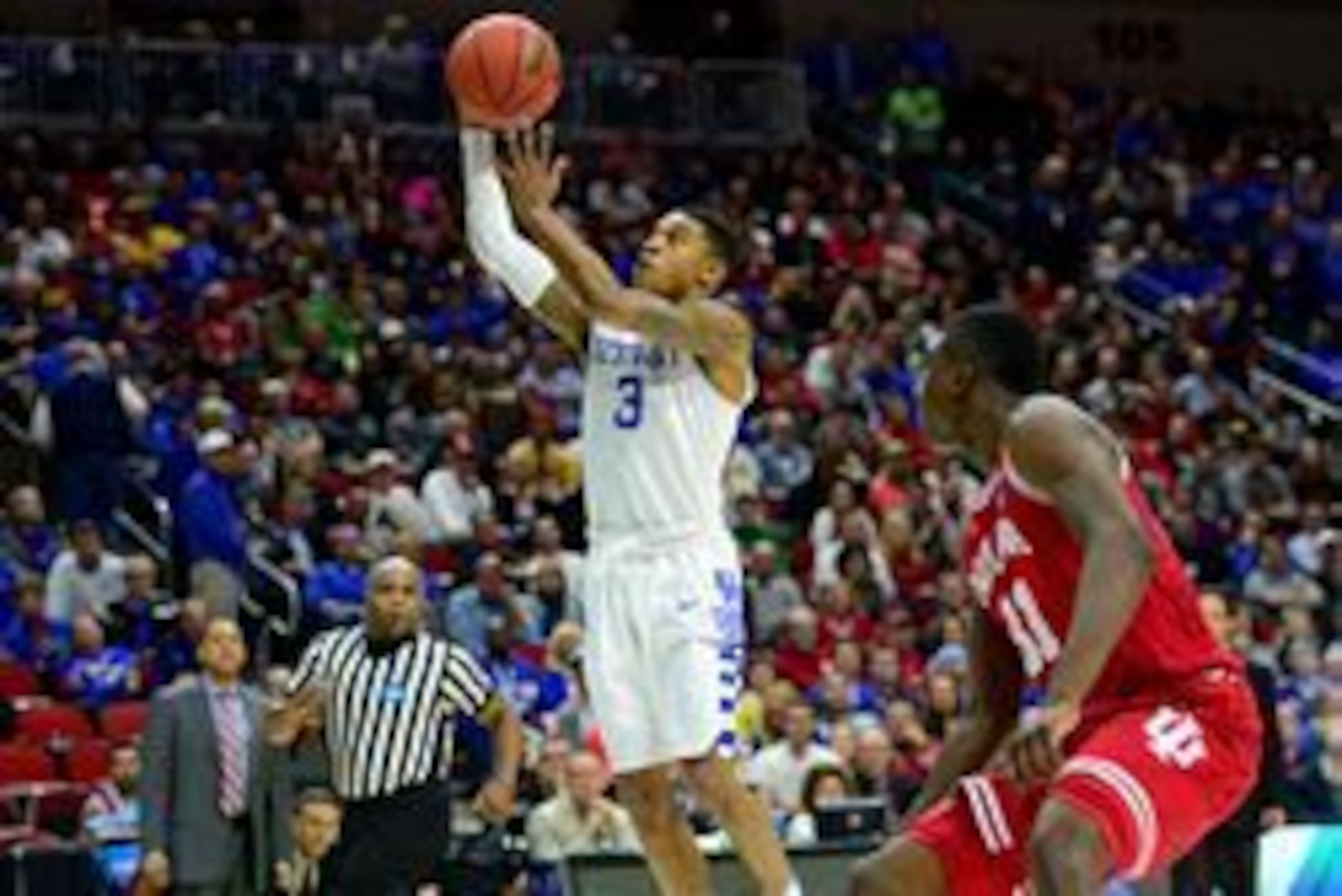Mar 19, 2016; Des Moines, IA, USA; Kentucky Wildcats guard Tyler Ulis (3) shoots the ball against Indiana Hoosiers center Thomas Bryant (31) in the first half during the second round of the 2016 NCAA Tournament at Wells Fargo Arena. Mandatory Credit: Jeff