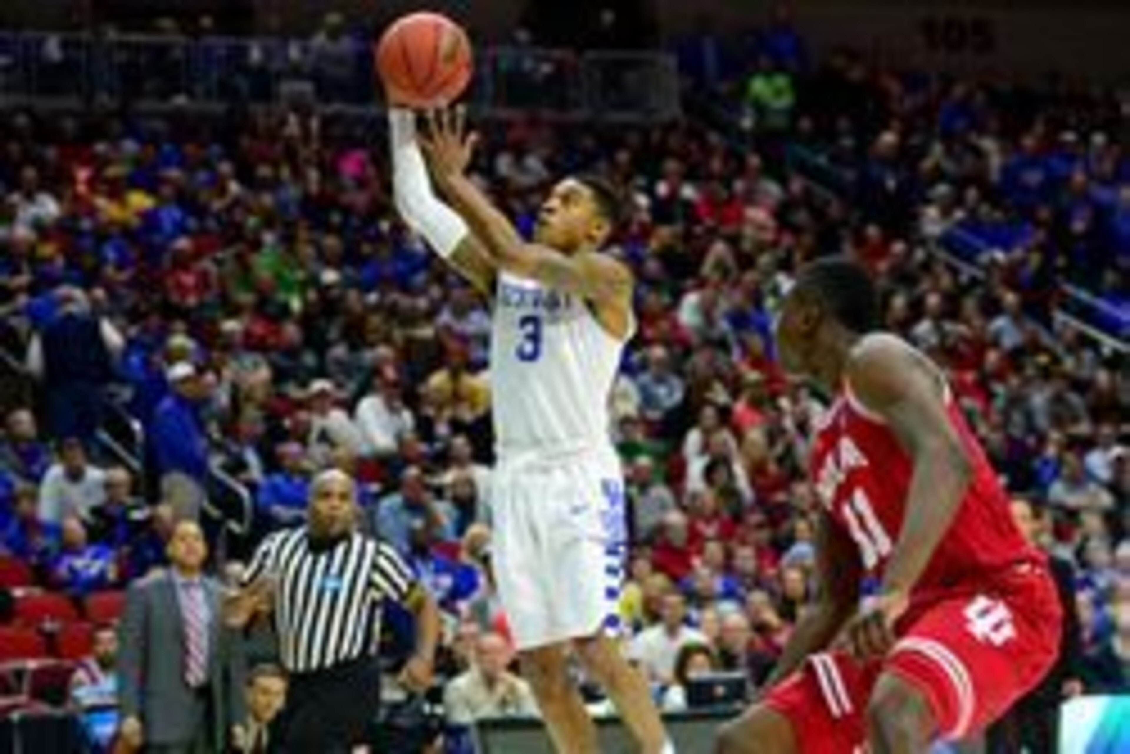 Mar 19, 2016; Des Moines, IA, USA; Kentucky Wildcats guard Tyler Ulis (3) shoots the ball against Indiana Hoosiers center Thomas Bryant (31) in the first half during the second round of the 2016 NCAA Tournament at Wells Fargo Arena. Mandatory Credit: Jeff