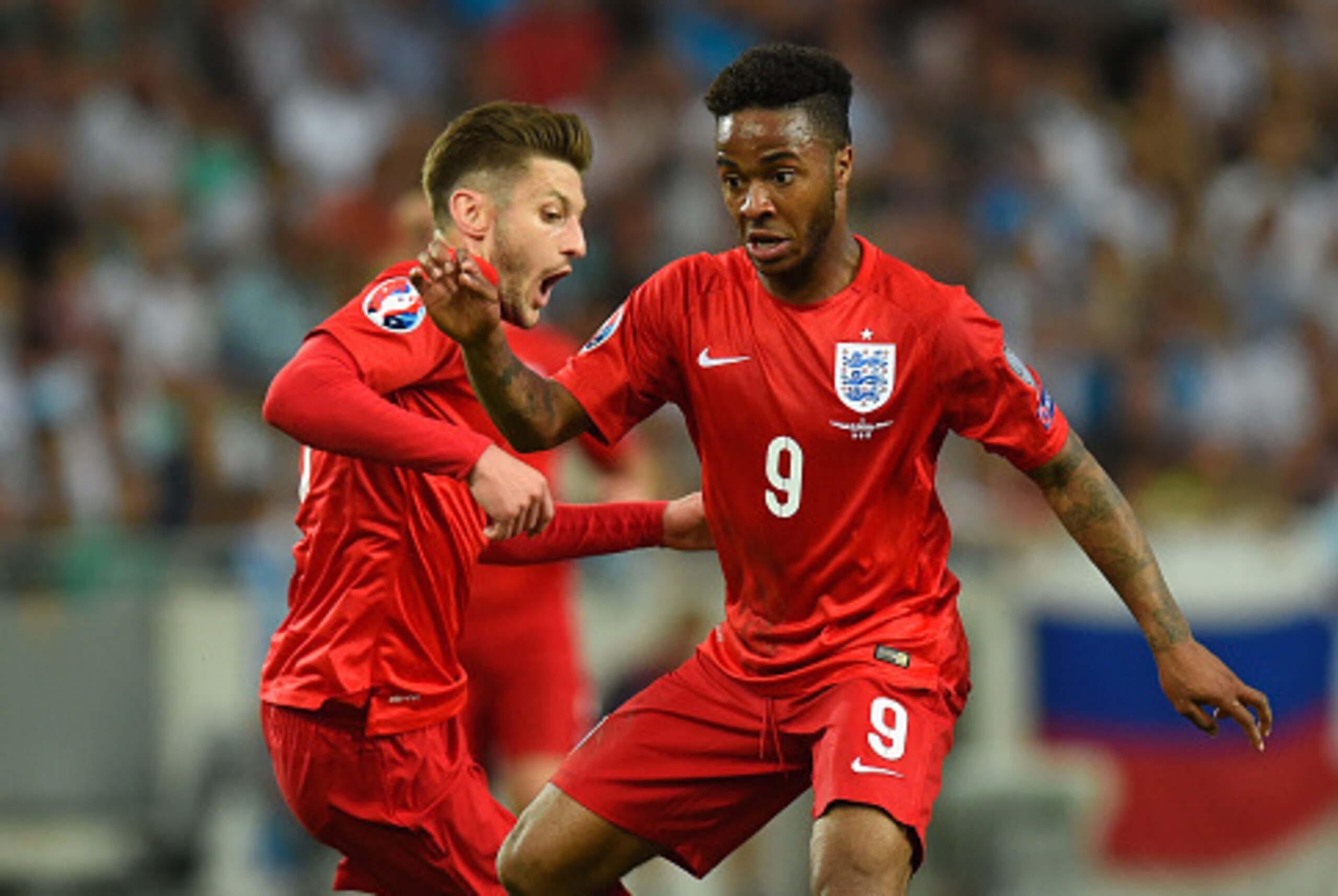 LJUBLJANA, SLOVENIA - JUNE 14:  England player Raheem Sterling (r) and Adam Lallana in action during the UEFA EURO 2016 Qualifier between Slovenia and England on at the Stozice Arena on June 14, 2015 in Ljubljana, Slovenia.  (Photo by Stu Forster/Getty Im