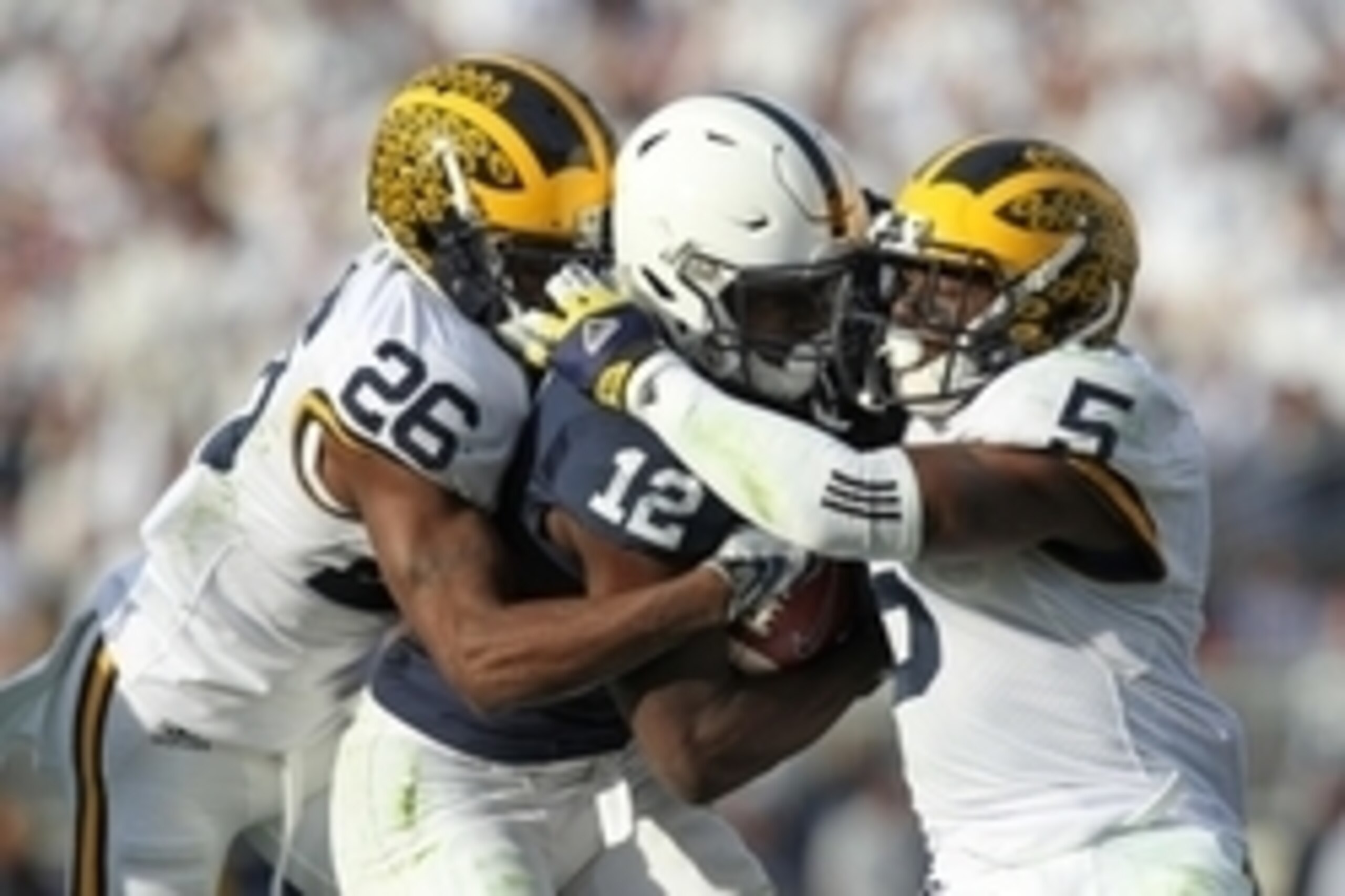 Nov 21, 2015; University Park, PA, USA; Penn State Nittany Lions wide receiver Chris Godwin (12) runs with the ball as Michigan Wolverines cornerback Jourdan Lewis (26) and safety Jabrill Peppers (5) attempt to tackle during the third quarter at Beaver St Nov 21, 2015; University Park, PA, USA; Penn State Nittany Lions wide receiver Chris Godwin (12) runs with the ball as Michigan Wolverines cornerback Jourdan Lewis (26) and safety Jabrill Peppers (5) attempt to tackle during the third quarter at Beaver St
