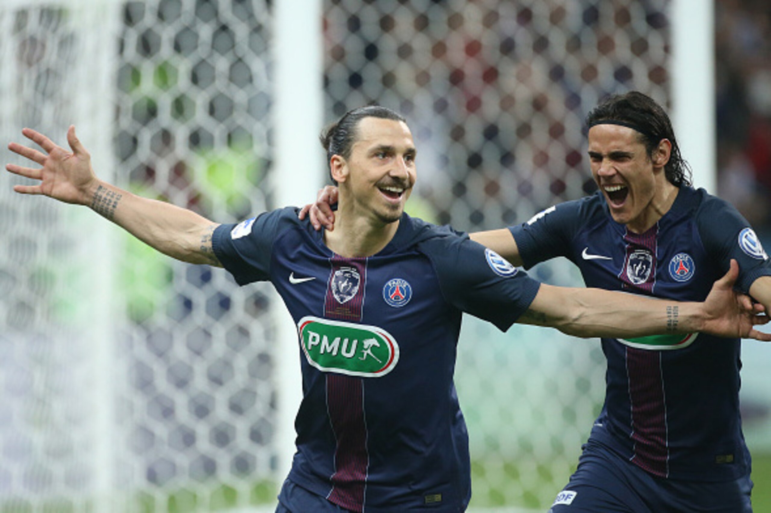PARIS, FRANCE - MAY 21: Zlatan Ibrahimovic of PSG celebrates his goal with Edinson Cavani of PSG during the French Cup Final match between Paris Saint-Germain (PSG) and Olympique de Marseille (OM) at Stade de France on May 21, 2016 in Saint-Denis nearby P