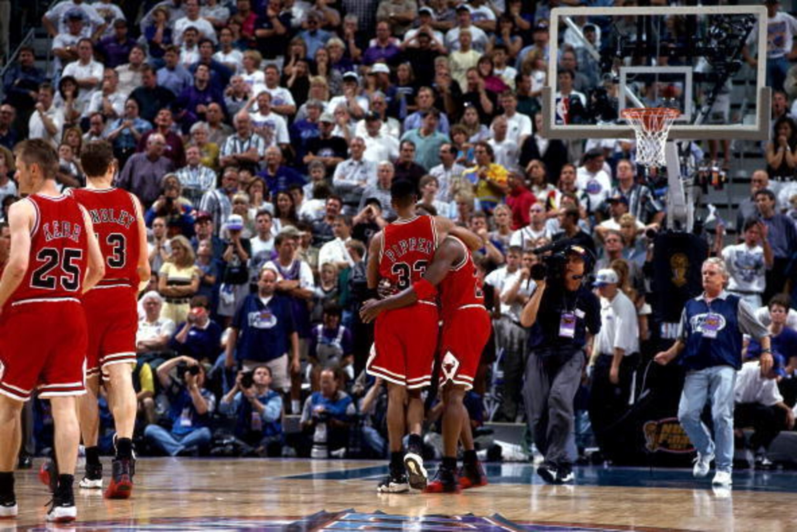 SALT LAKE CITY, UT - JUNE 11: Michael Jordan #23 of the Chicago Bulls is helped off the court by Scottie Pippen #33 during Game Five of the 1997 NBA Finals played against the Utah Jazz on June 11, 1997 at the Delta Center in Salt Lake City, Utah. The Chic SALT LAKE CITY, UT - JUNE 11: Michael Jordan #23 of the Chicago Bulls is helped off the court by Scottie Pippen #33 during Game Five of the 1997 NBA Finals played against the Utah Jazz on June 11, 1997 at the Delta Center in Salt Lake City, Utah. The Chic