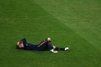 JOHANNESBURG, SOUTH AFRICA - JULY 11:  Fernando Torres of Spain lies on the pitch injured during the 2010 FIFA World Cup South Africa Final match between Netherlands and Spain at Soccer City Stadium on July 11, 2010 in Johannesburg, South Africa.  (Photo