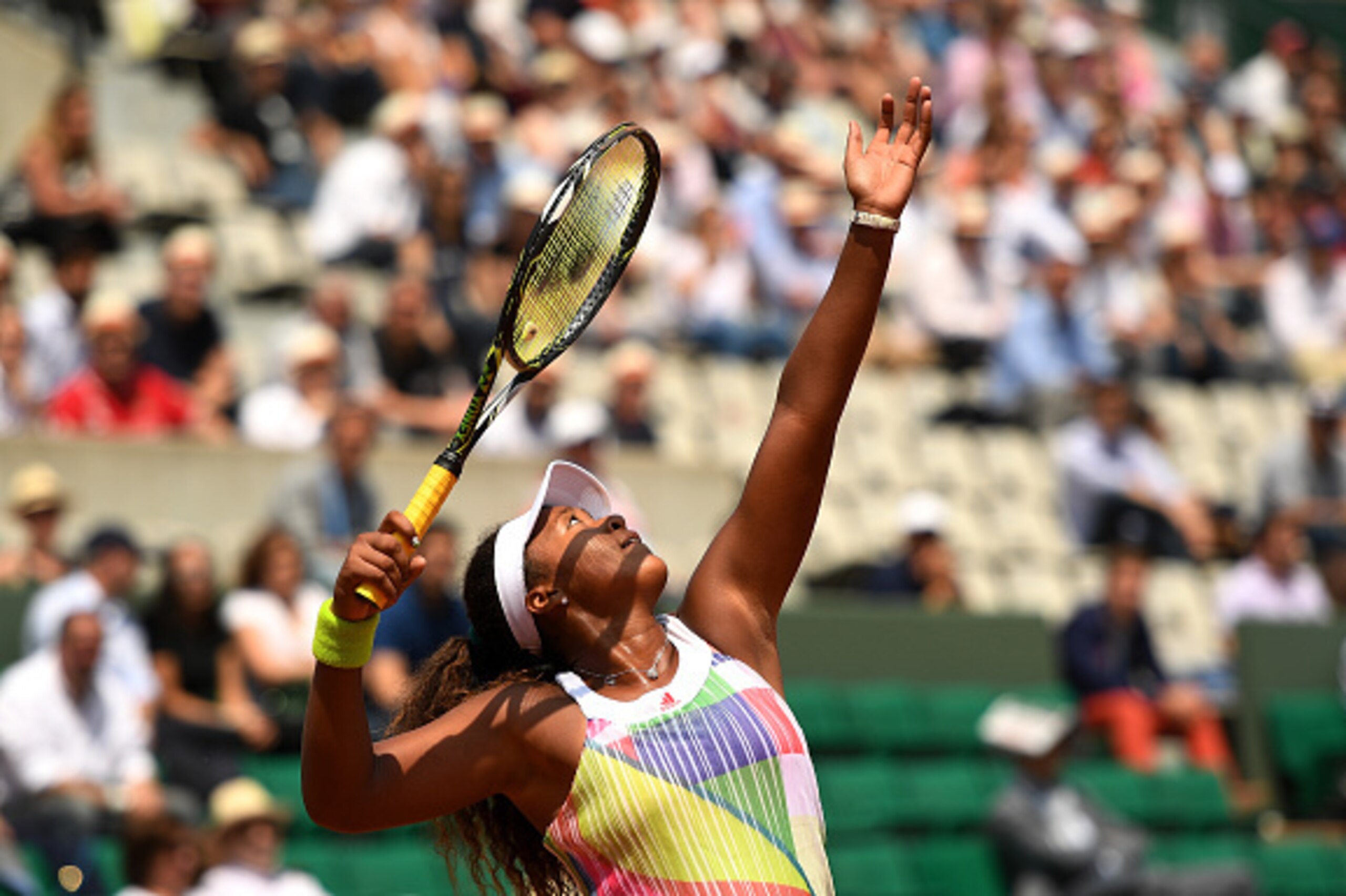 PARIS, FRANCE - MAY 27:  Naomi Osaka of Japan serves during the Ladies Singles third round match against Simona Halep of Romania on day six of the 2016 French Open at Roland Garros on May 27, 2016 in Paris, France.  (Photo by Dennis Grombkowski/Getty Imag