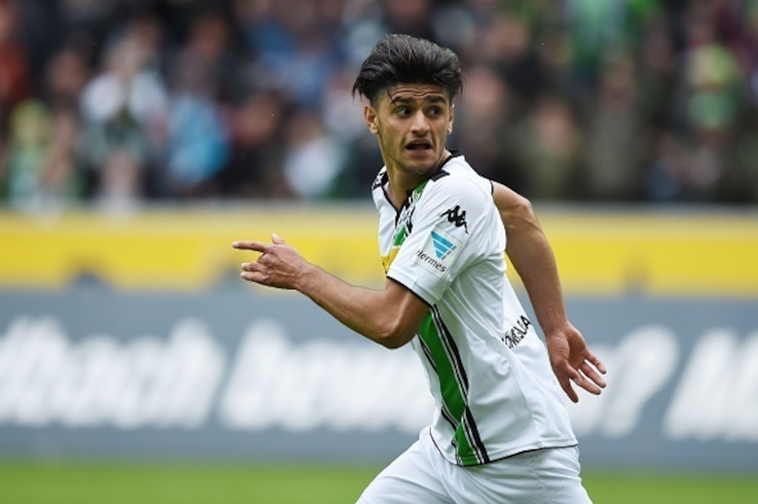 Moenchengladbach's midfielder Mahmoud Dahoud celebrates during the German first division Bundesliga football match Borussia Moenchengladbach vs Hoffenheim in Moenchengladbach, western Germany, on April 24, 2016.  

 / AFP / PATRIK STOLLARZ / RESTRICTIONS: