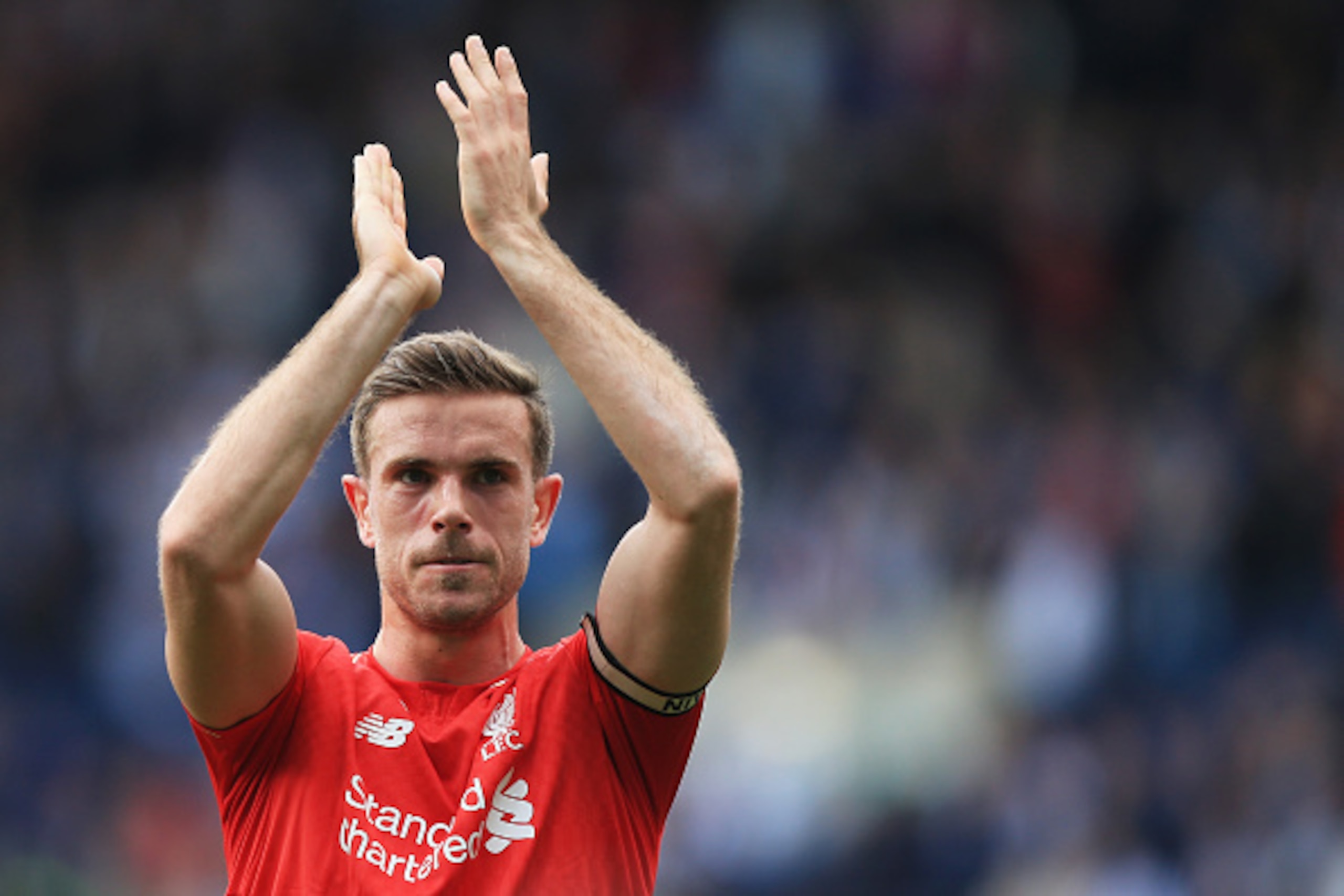WEST BROMWICH, ENGLAND - MAY 15: Jordan Henderson of Liverpool applauds supporters after the Barclays Premier League match between West Bromwich Albion and Liverpool at The Hawthorns on May 15, 2016 in West Bromwich, England.