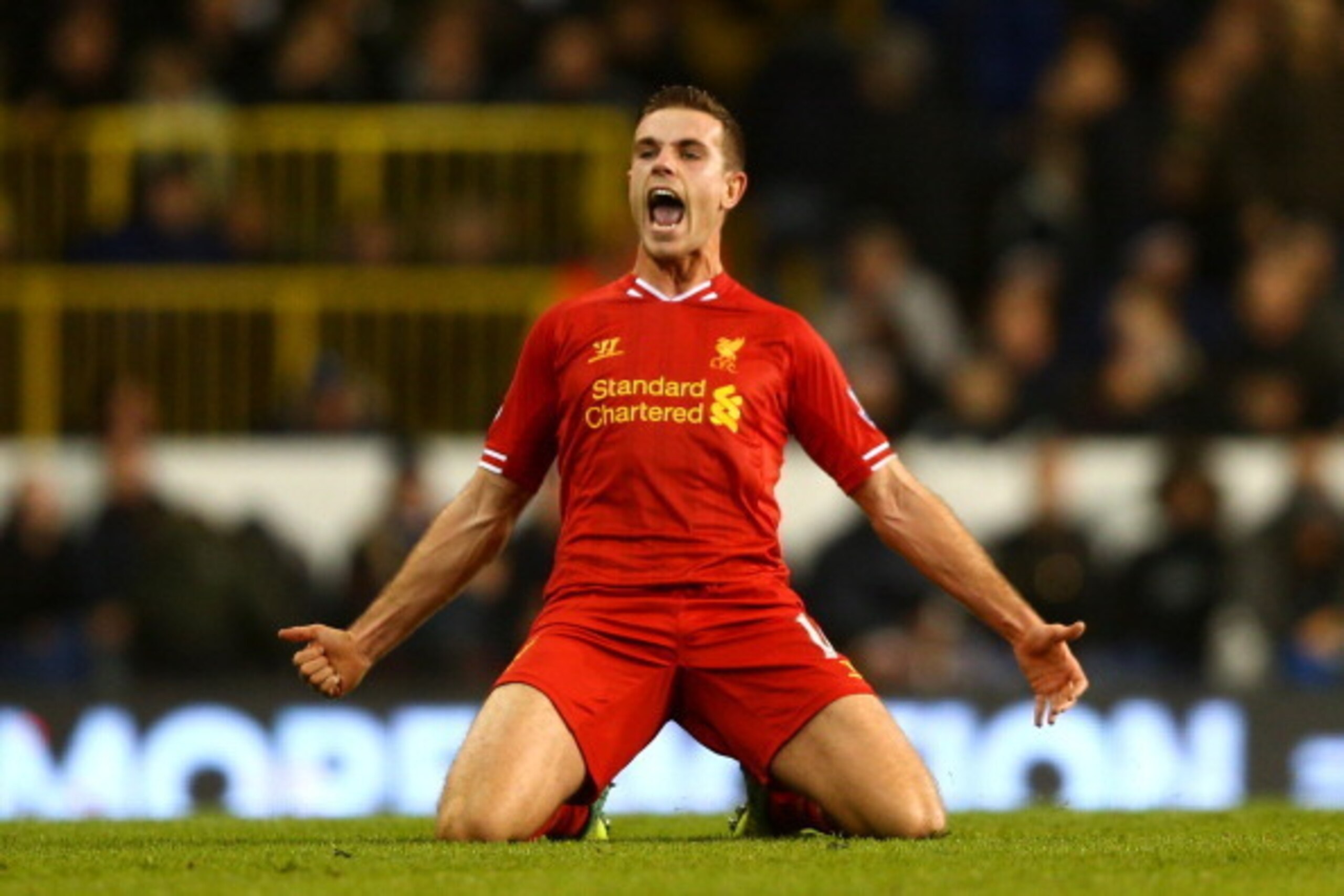 LONDON, ENGLAND - DECEMBER 15:  Jordan Henderson of Liverpool celebrates scoring their second goal during the Barclays Premier League match between Tottenham Hotspur and Liverpool at White Hart Lane on December 15, 2013 in London, England.  (Photo by Paul