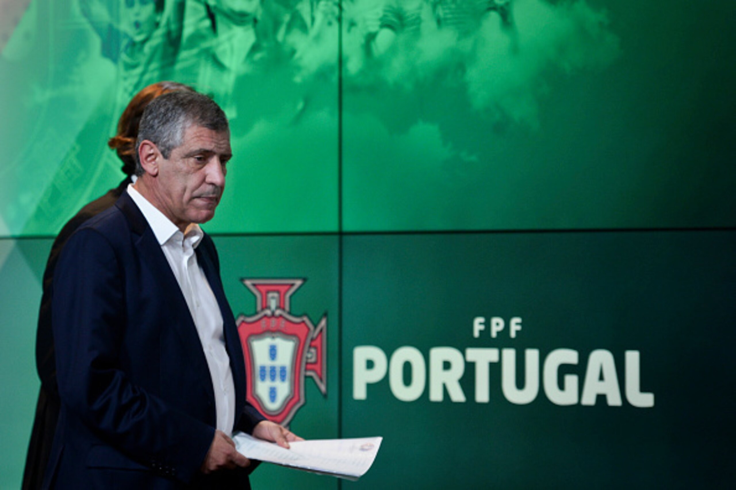 Portugal's football team head coach Fernando Santos arrives for a press conference announcing the Portuguese squad for the Euro 2016 at Portugal's team training center 'Cidade do Futebol' (Football City) in Oeiras, on the outskirts of Lisbon on May 17, 20