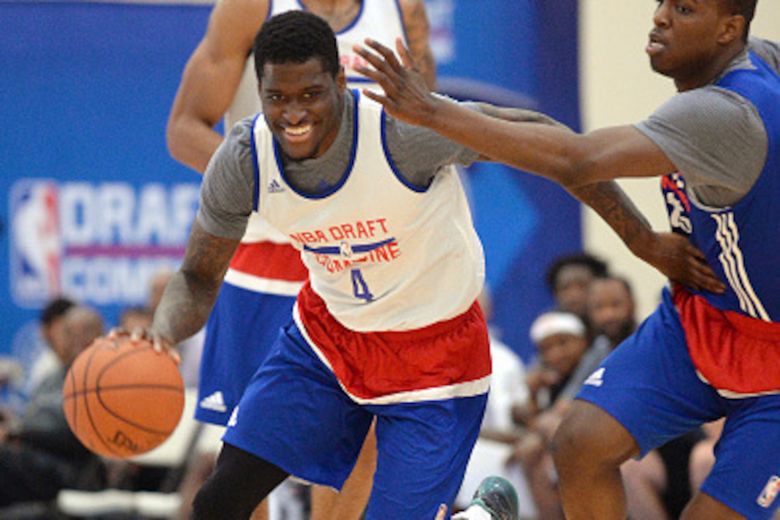 CHICAGO, IL - MAY 13:  A.J. English #4 moves the ball past Isaiah Whitehead #25 during the 2016 NBA Draft Combine on May 13, 2016 at the Quest Multisport in Chicago, Illinois. NOTE TO USER: User expressly acknowledges and agrees that, by downloading and/o