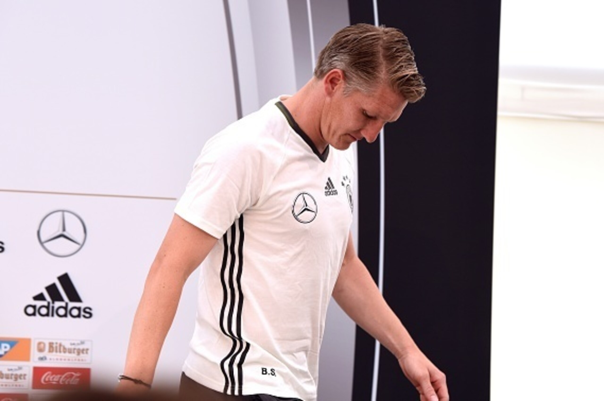 Germany's national football team midfielder Bastian Schweinsteiger gives a press conference on the sideline of the team's preparation for the upcoming Euro 2016 European football championships, on May 25, 2016 in Ascona.
 / AFP / PATRIK STOLLARZ        (P