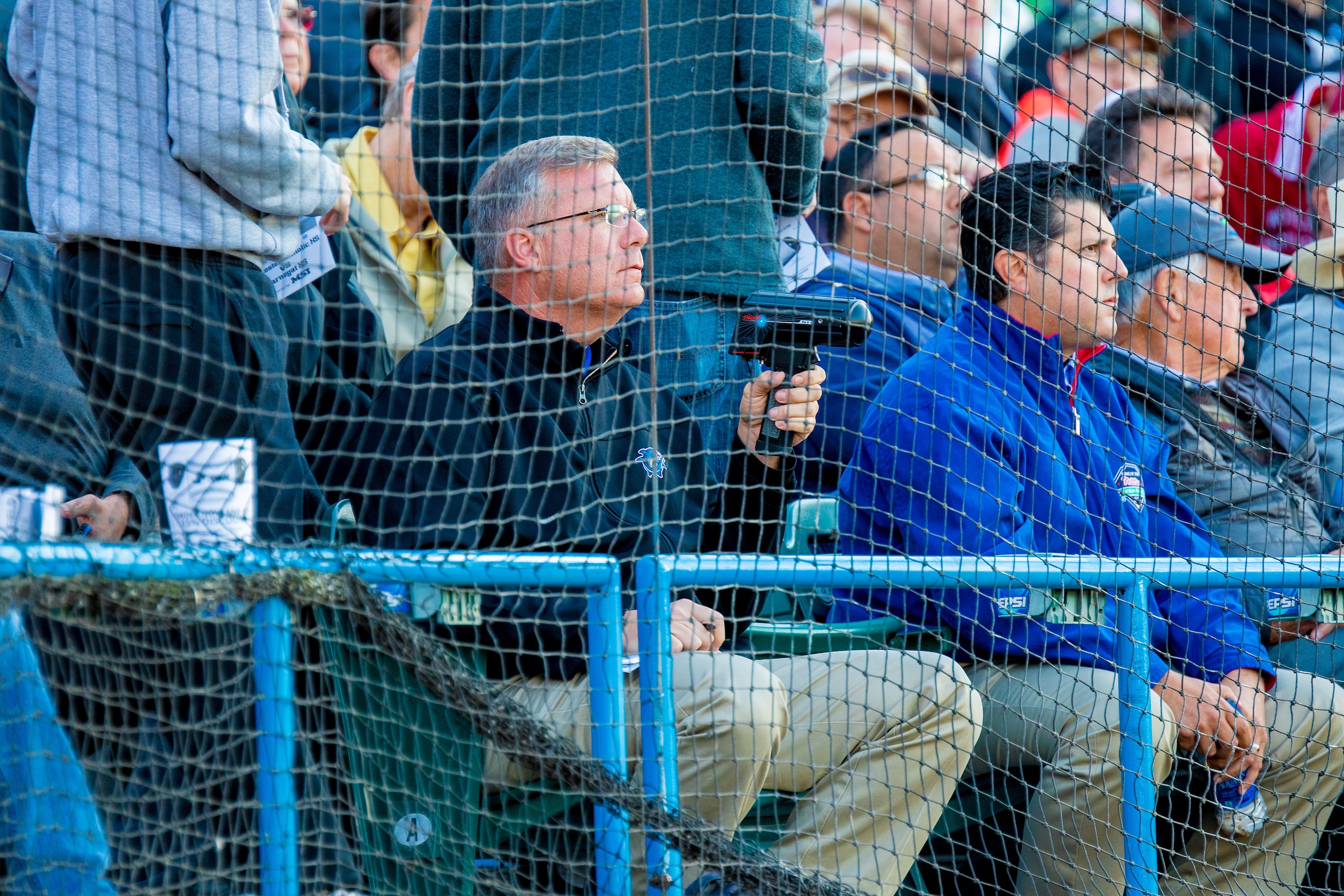 A major league scout trains the radar gun on Jason Groome's pitches.
